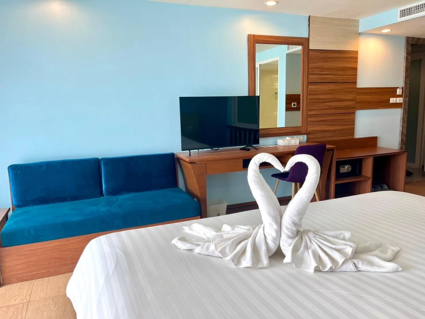 Photo of the whole room, Bed in Saisawan Beach Luxury Hotel