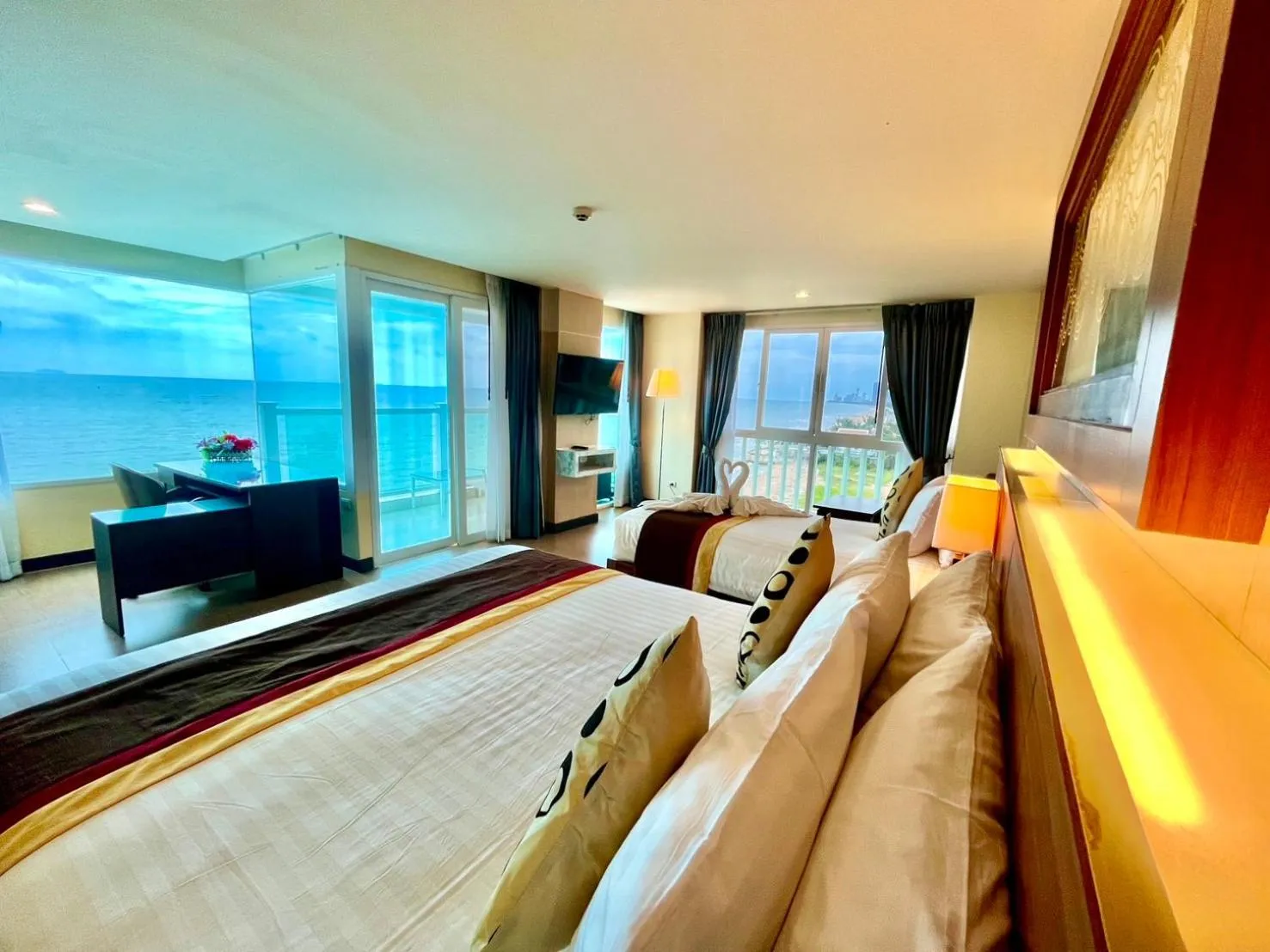 Photo of the whole room, Bed in Saisawan Beach Luxury Hotel