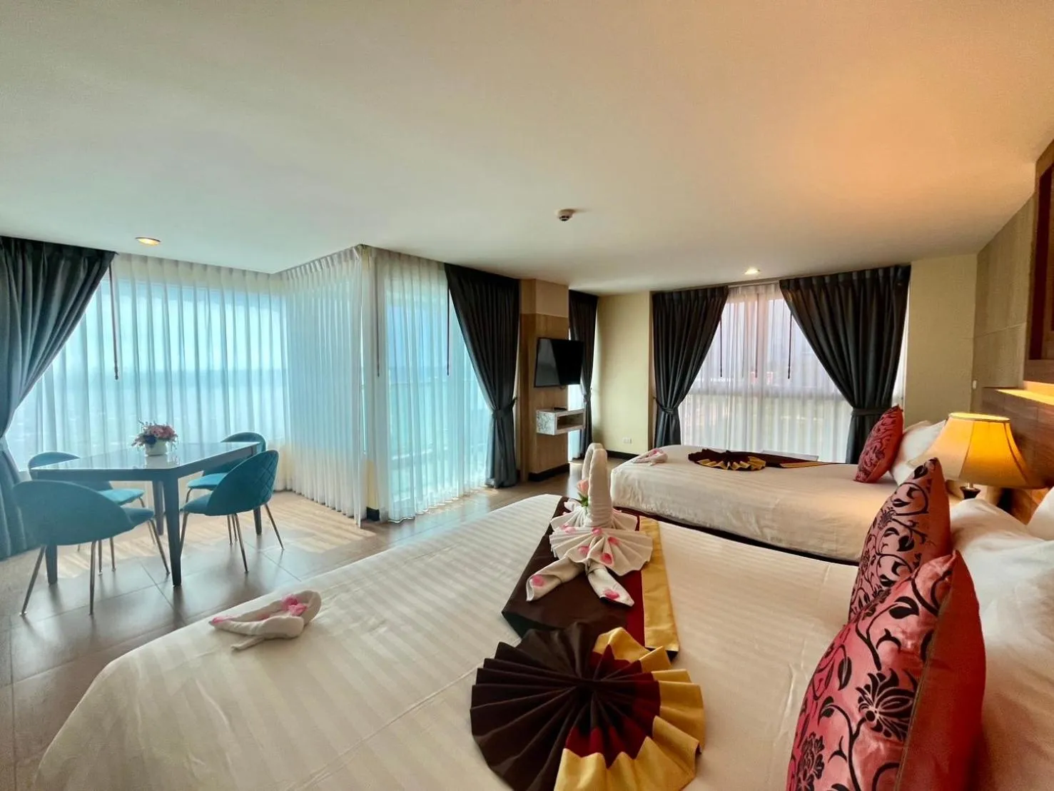 Photo of the whole room, Bed in Saisawan Beach Luxury Hotel