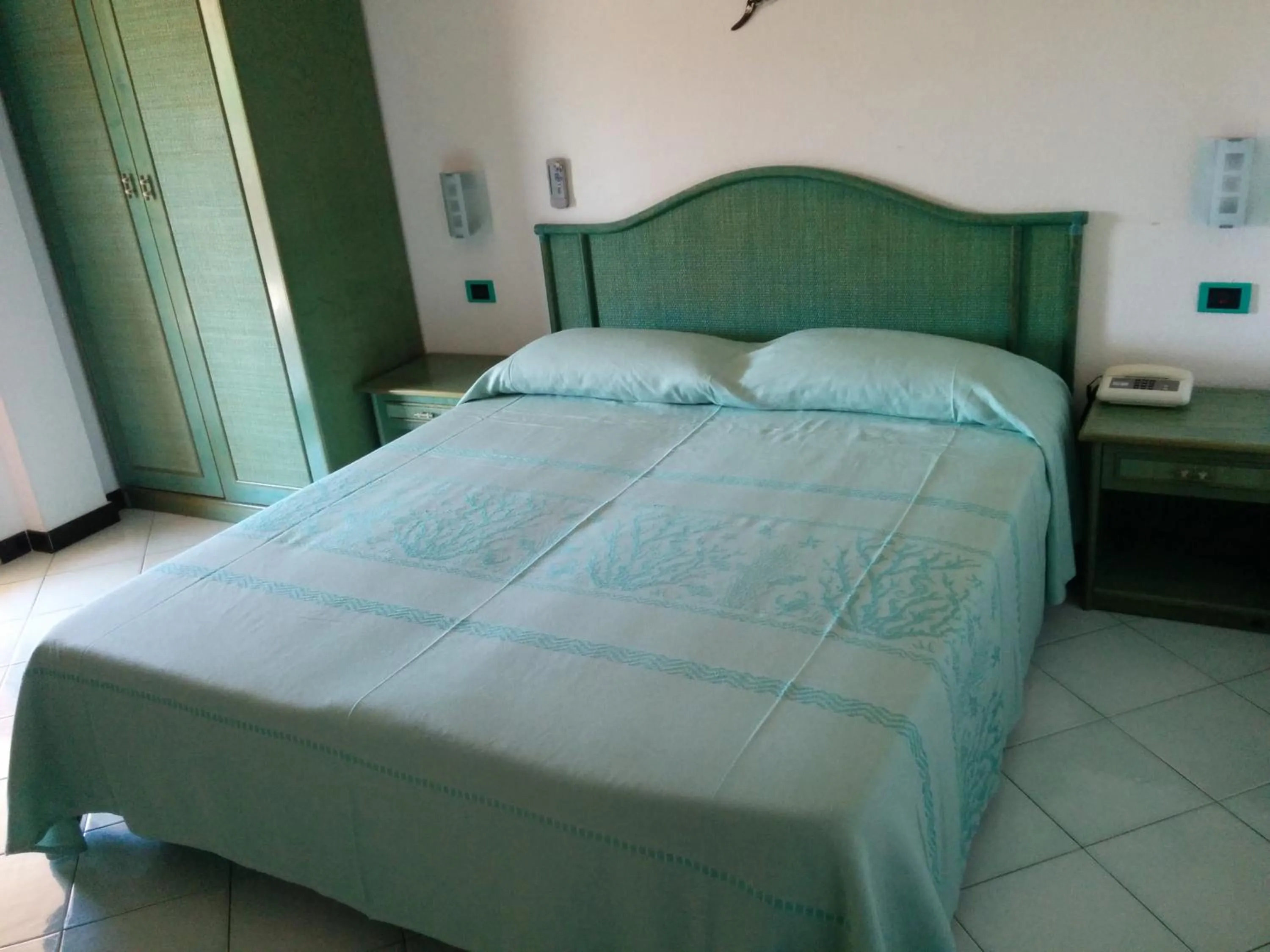 Bed in Hotel Blu Marlin