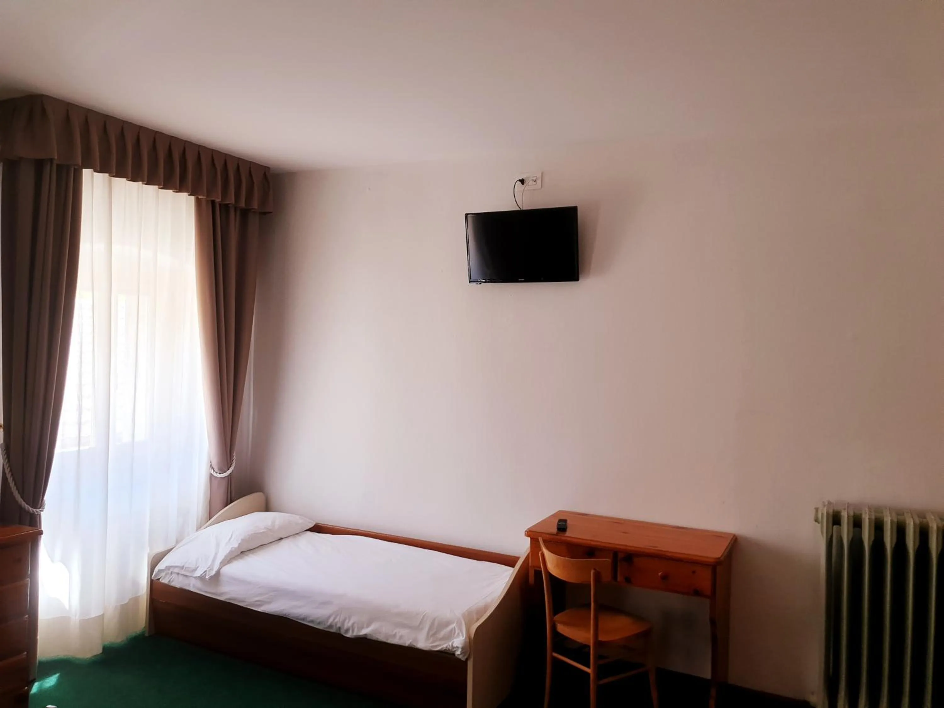 Photo of the whole room, Bed in Albergo Trieste