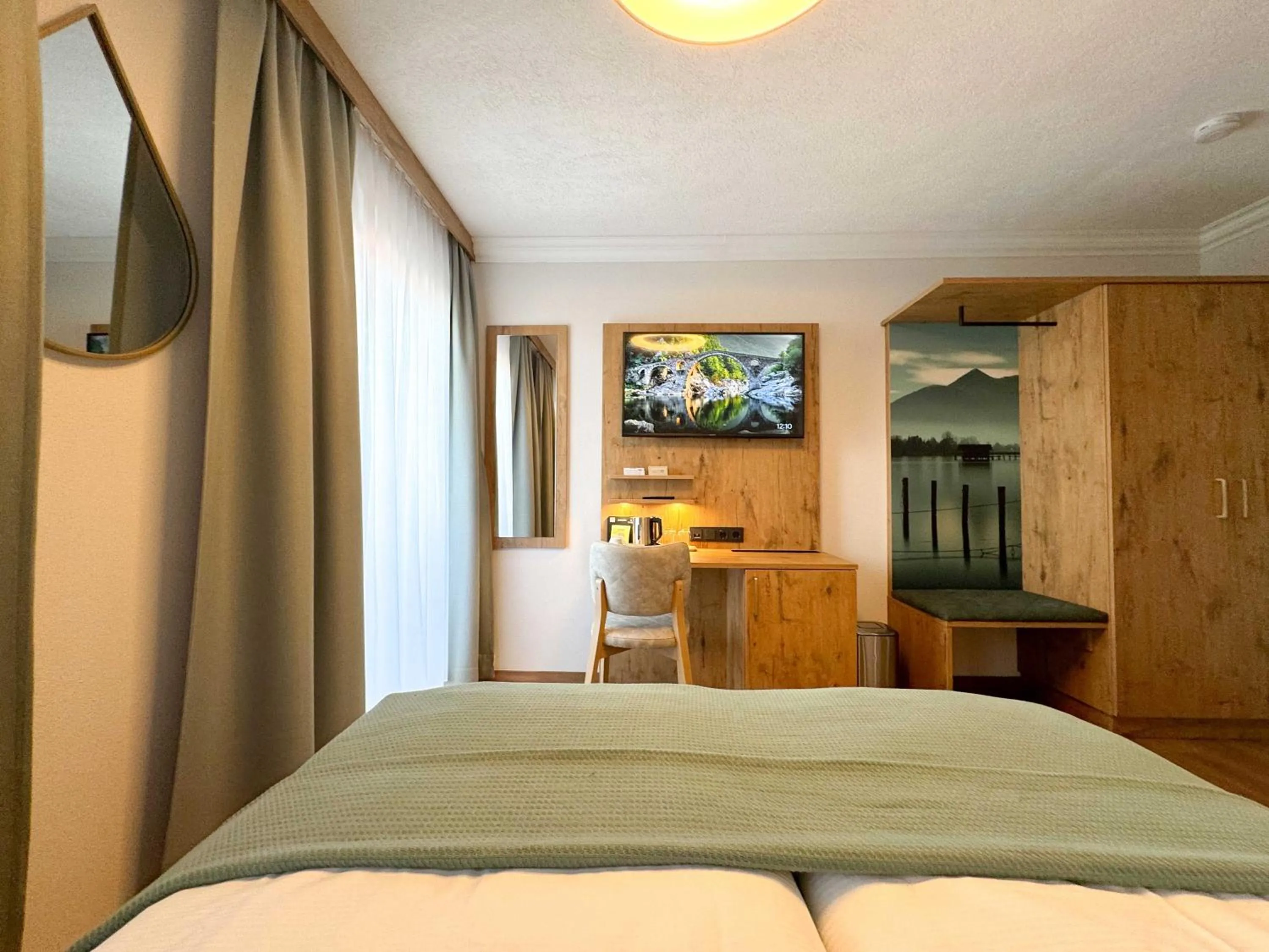 Photo of the whole room, Bed in Hotel Schlossblick Chiemsee