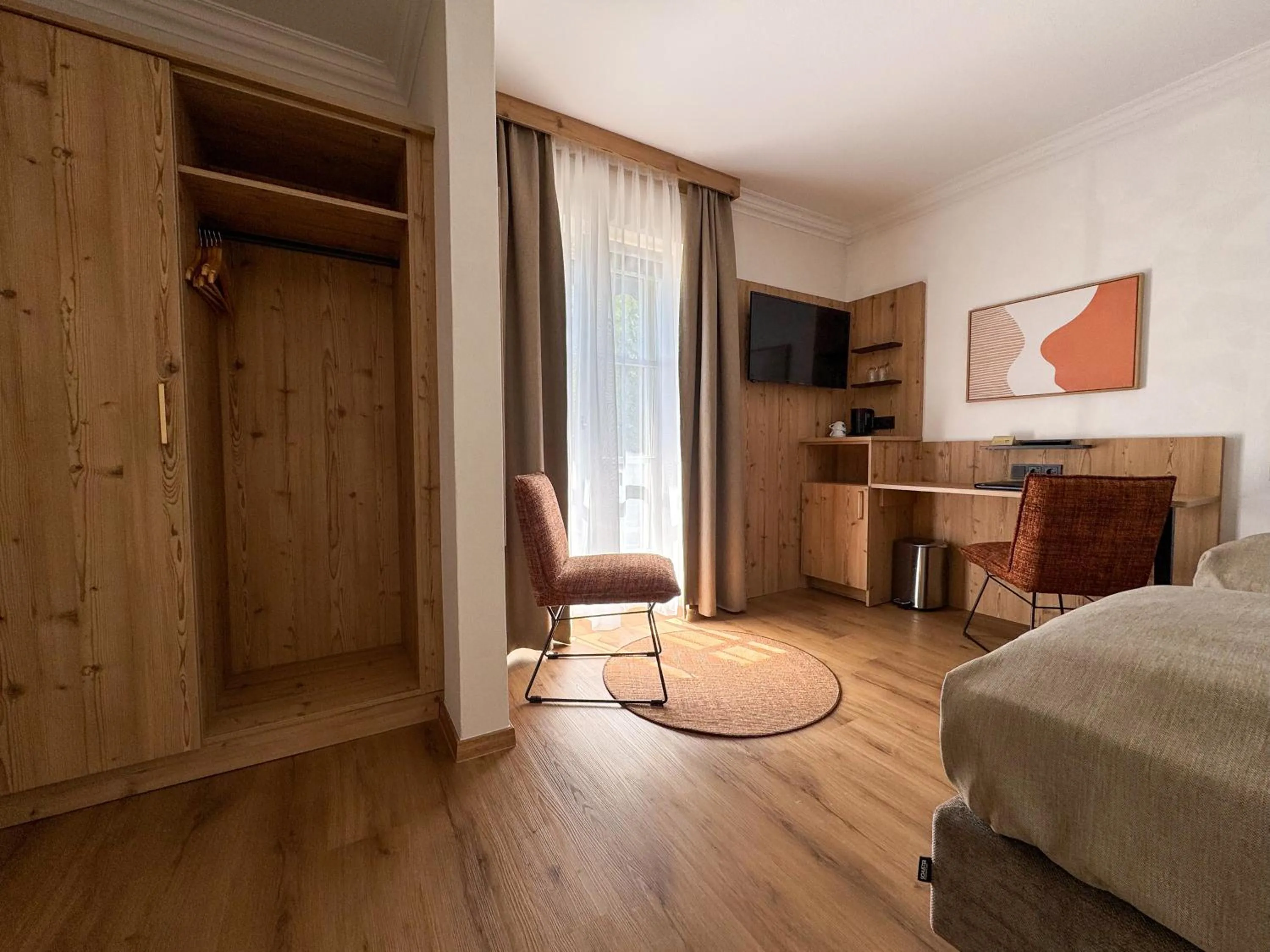 Photo of the whole room, Bed in Hotel Schlossblick Chiemsee