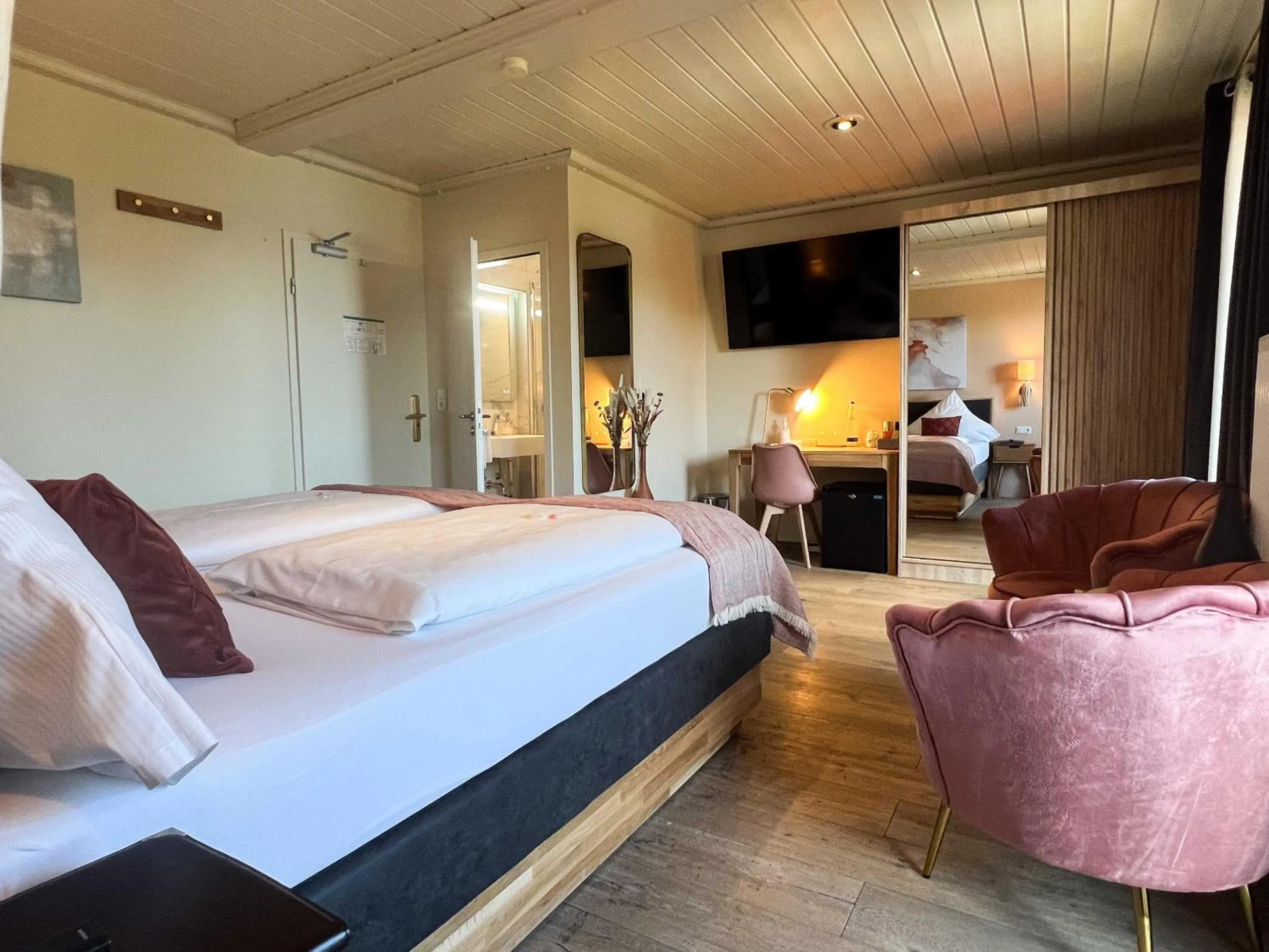 Photo of the whole room, Bed in Hotel Schlossblick Chiemsee