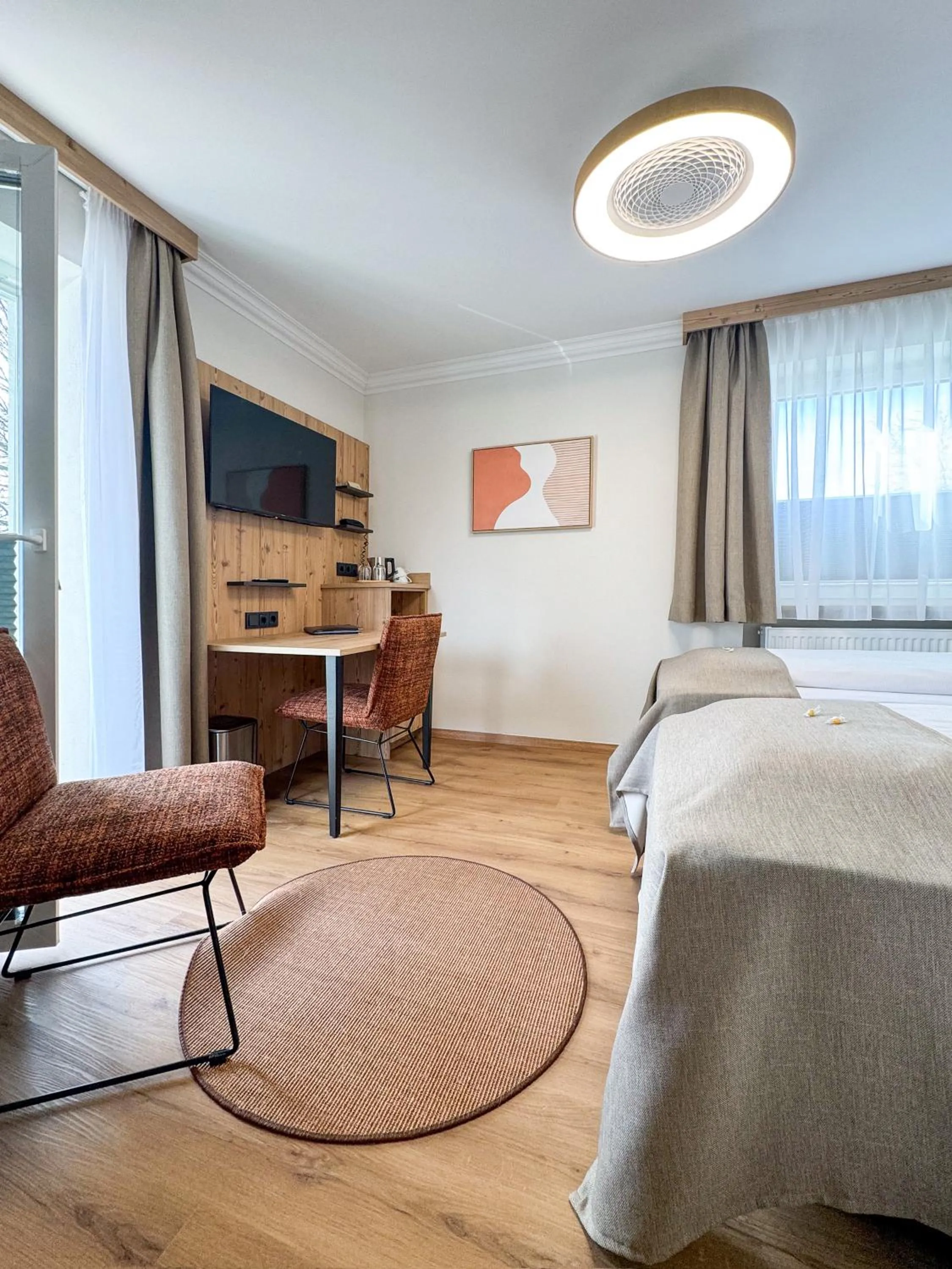 Photo of the whole room, Bed in Hotel Schlossblick Chiemsee