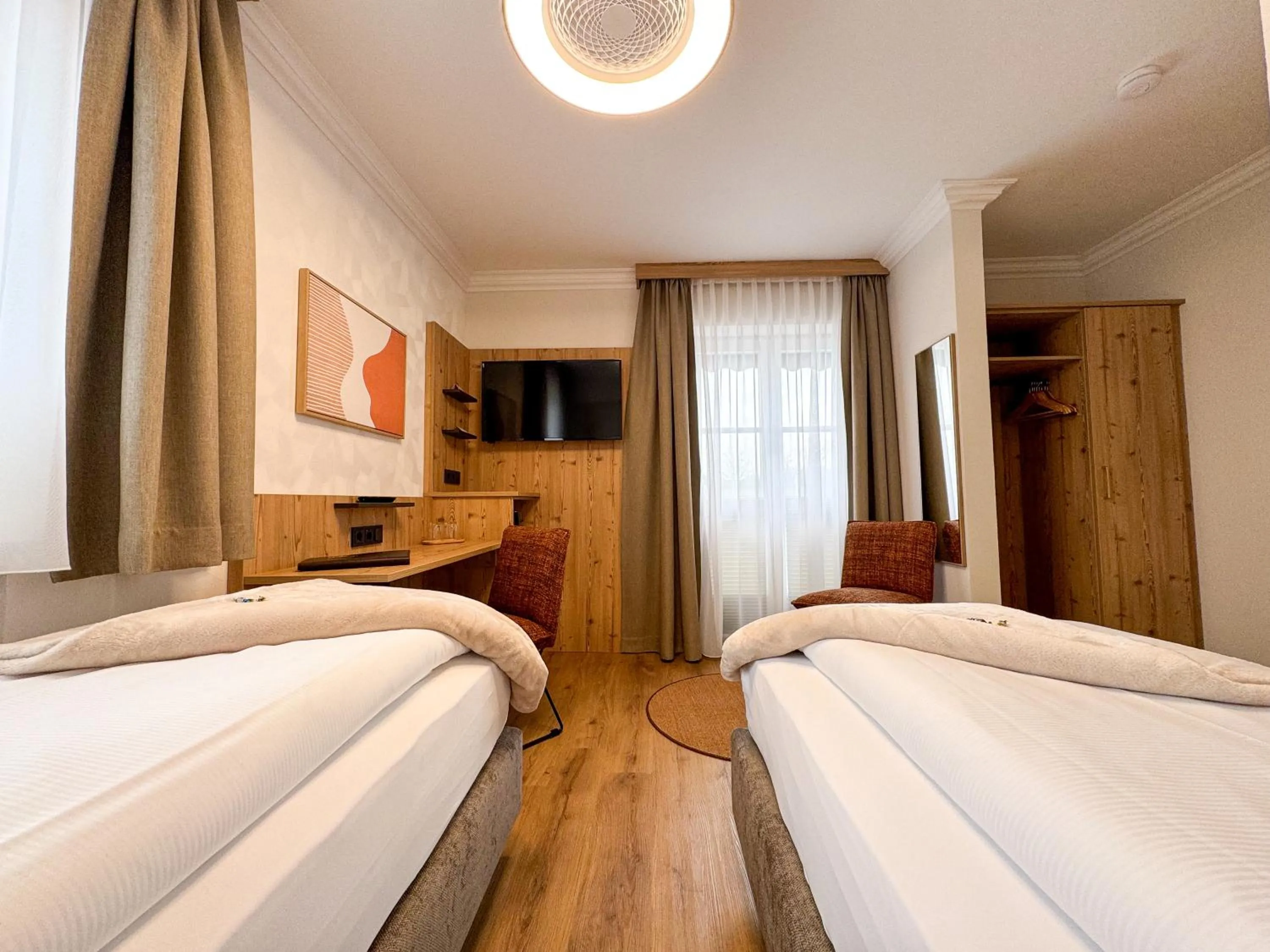 Photo of the whole room, Bed in Hotel Schlossblick Chiemsee