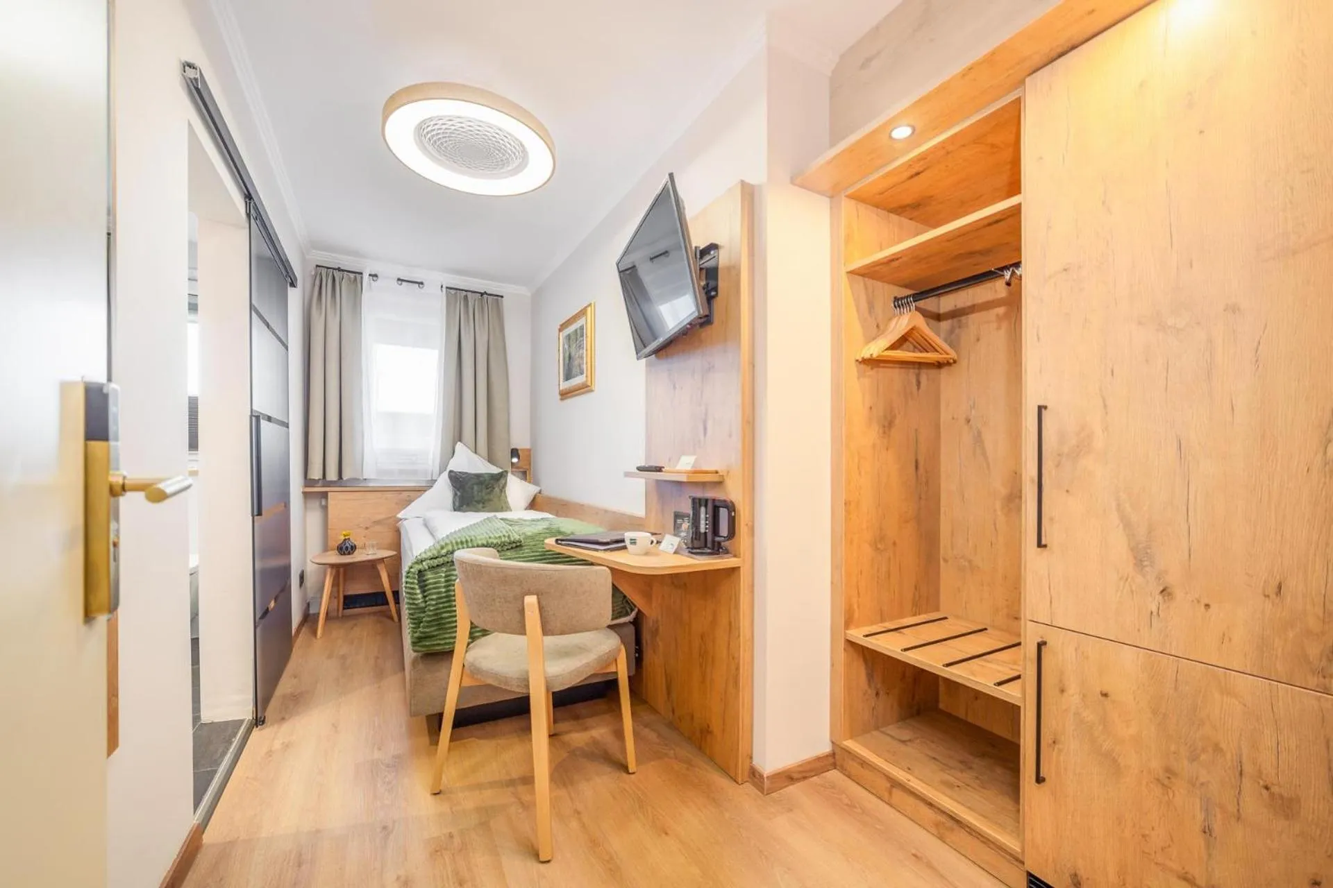 Photo of the whole room, Bed in Hotel Schlossblick Chiemsee