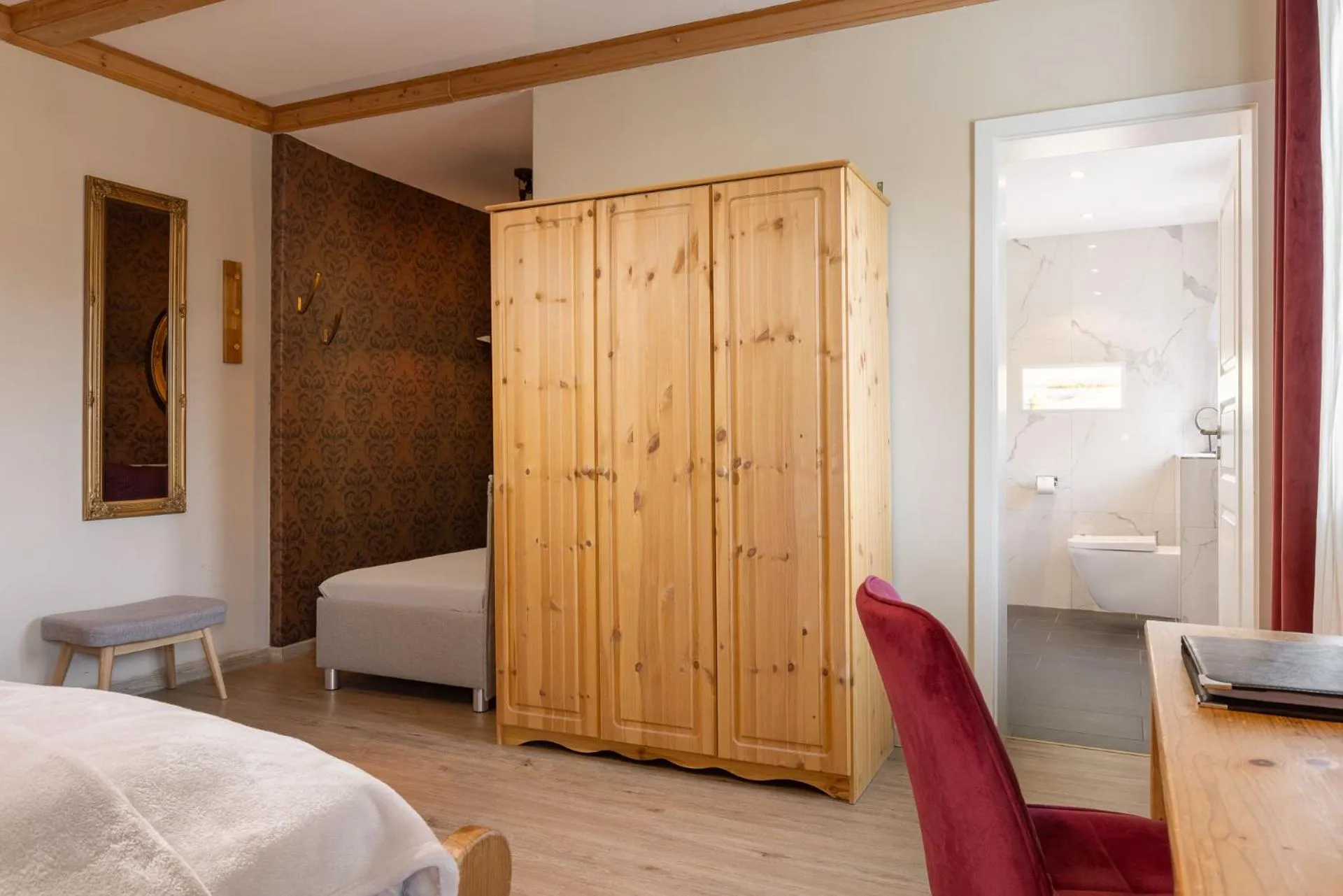 Photo of the whole room, Bed in Hotel Schlossblick Chiemsee