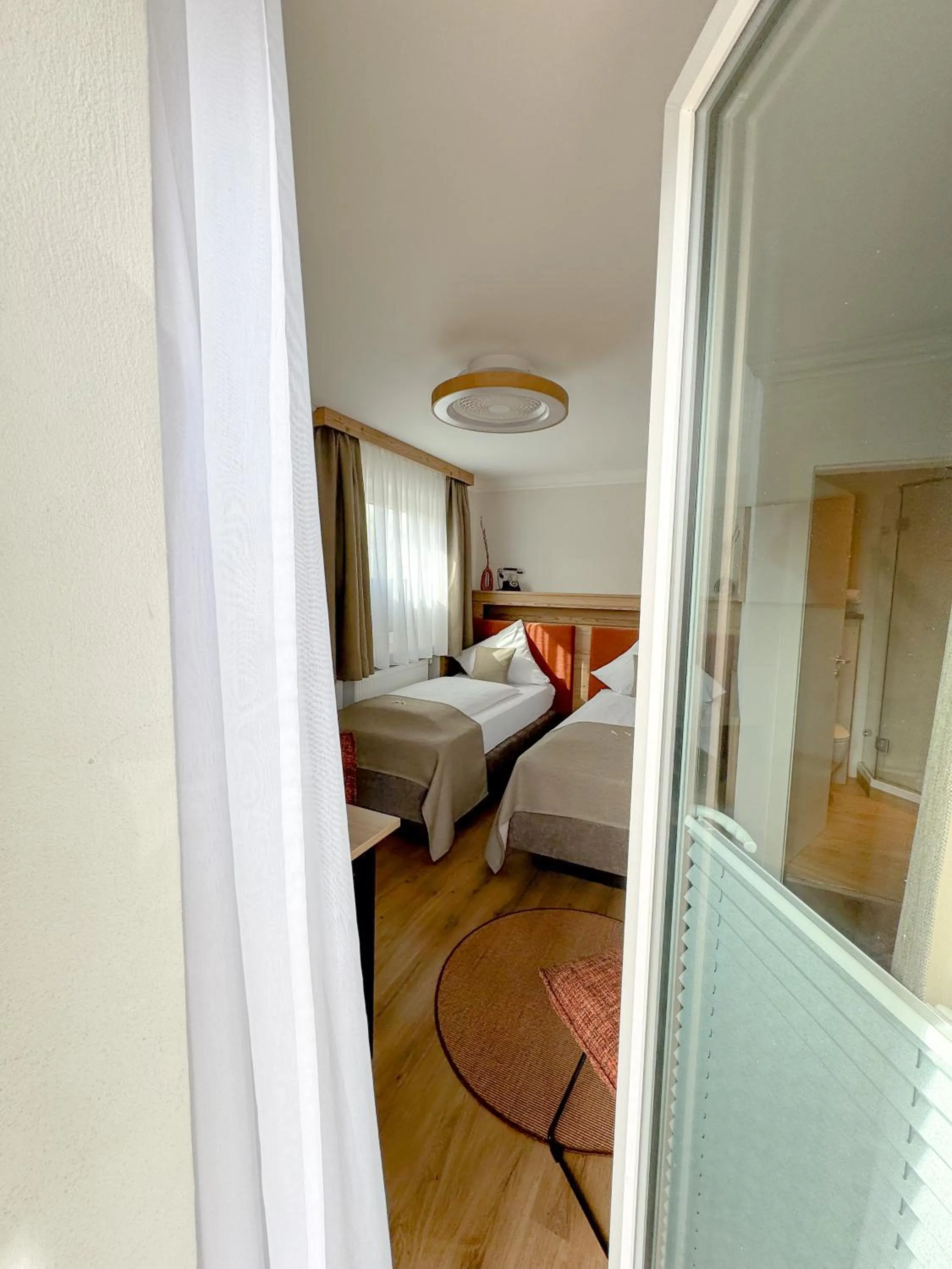 Photo of the whole room, Bed in Hotel Schlossblick Chiemsee