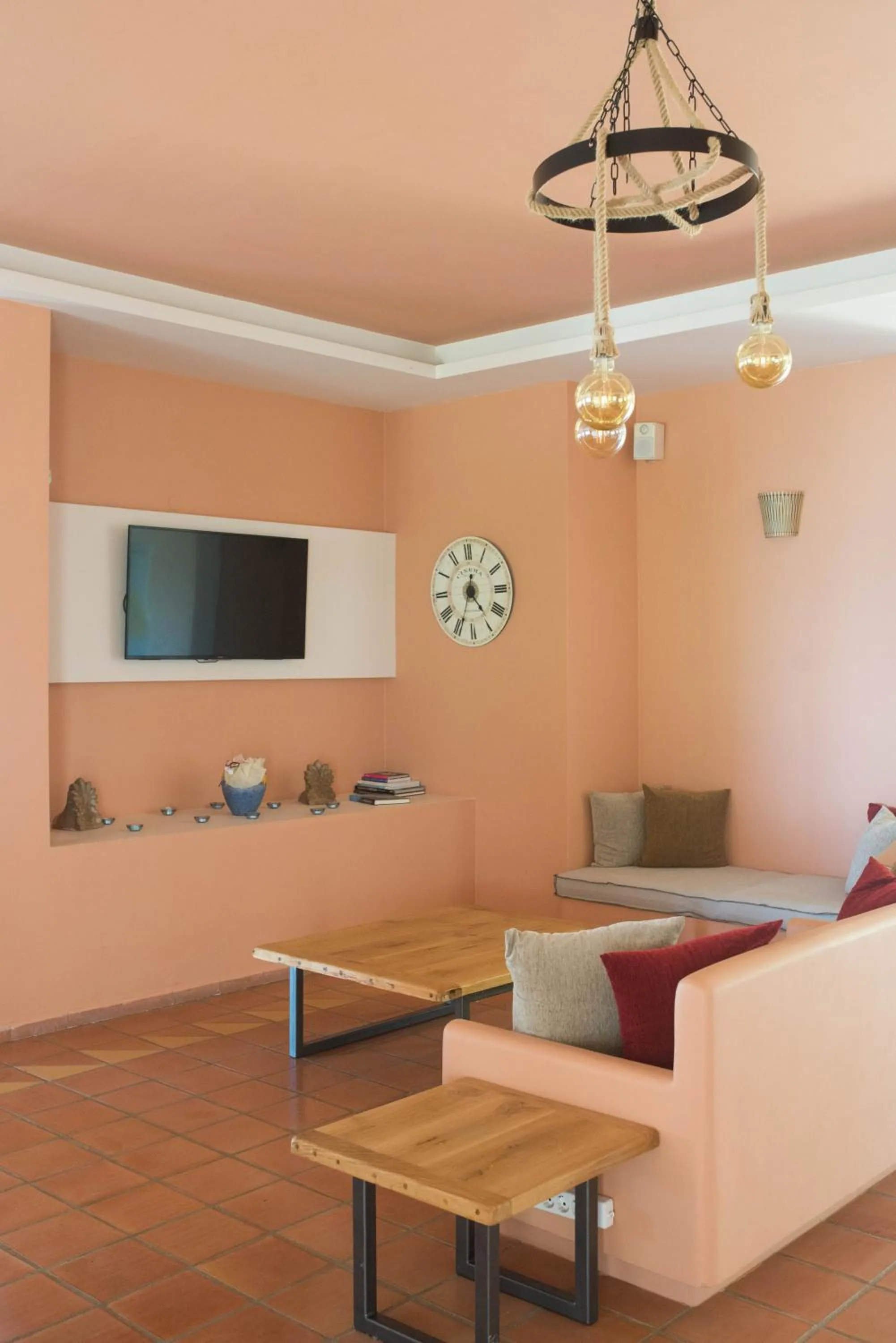 Communal lounge/ TV room in Mounda Beach Hotel