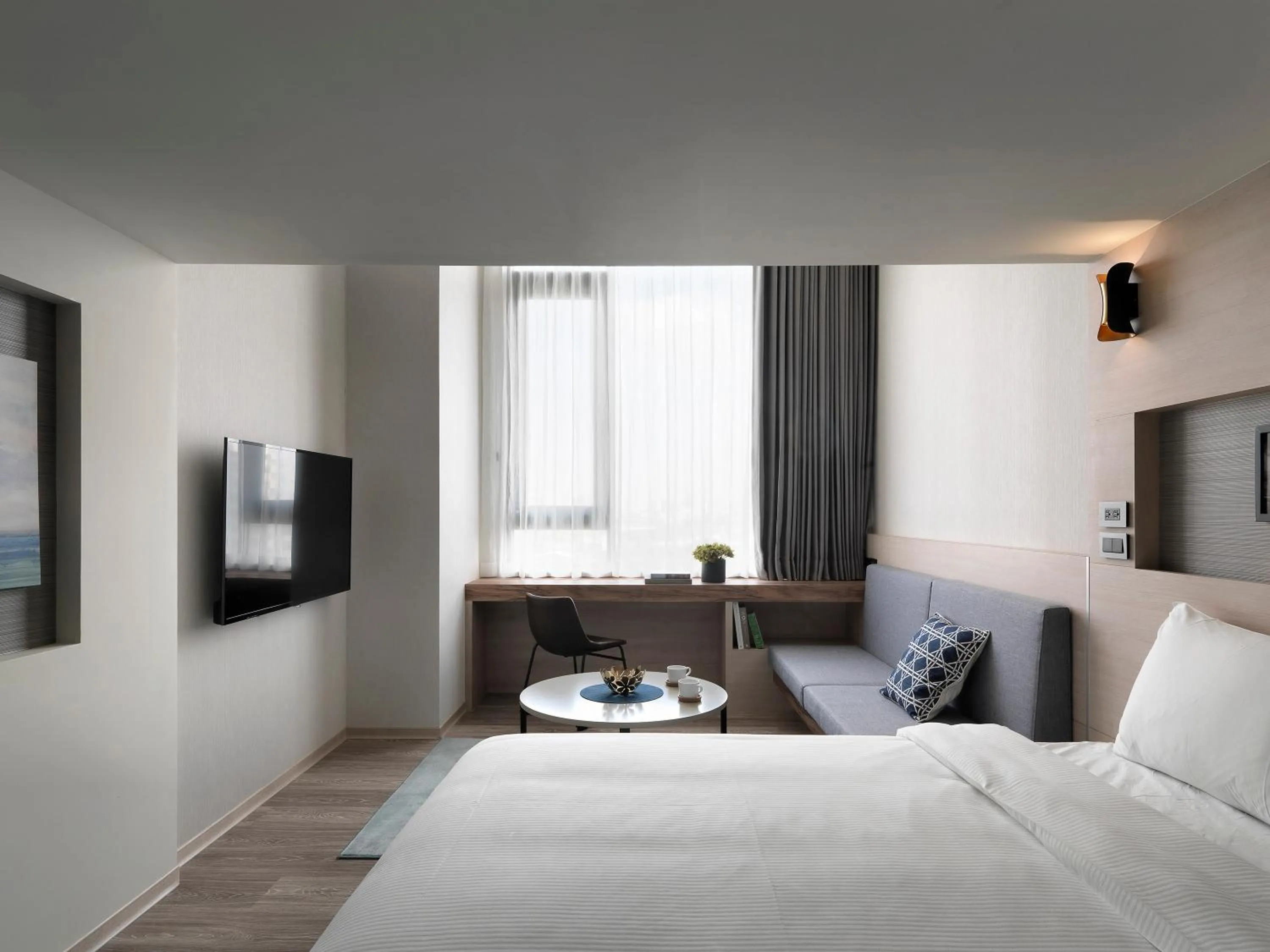 Bed in Explore Hotel