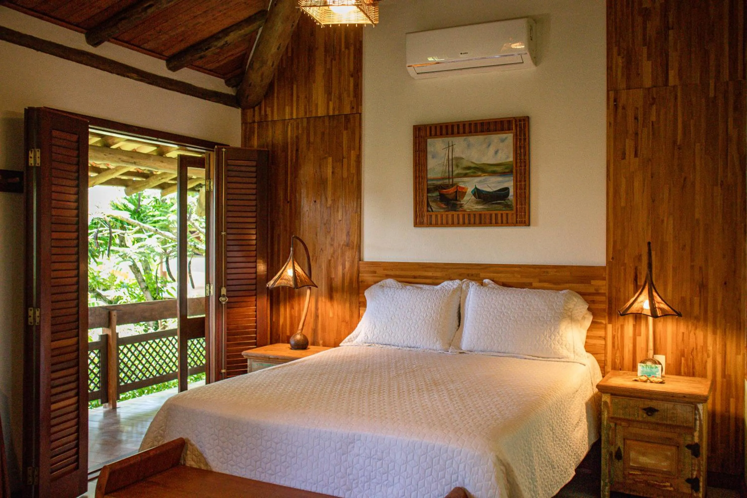 Bed in Pousada Barrabella