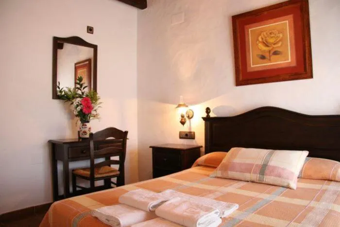 Photo of the whole room, Bed in Hostal Torre de Guzmán