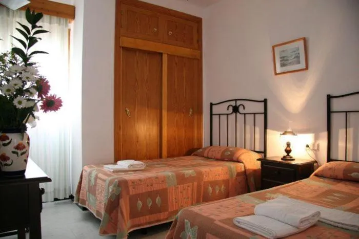 Photo of the whole room, Bed in Hostal Torre de Guzmán