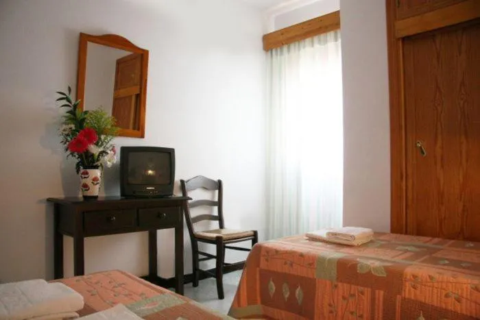 Photo of the whole room, Bed in Hostal Torre de Guzmán