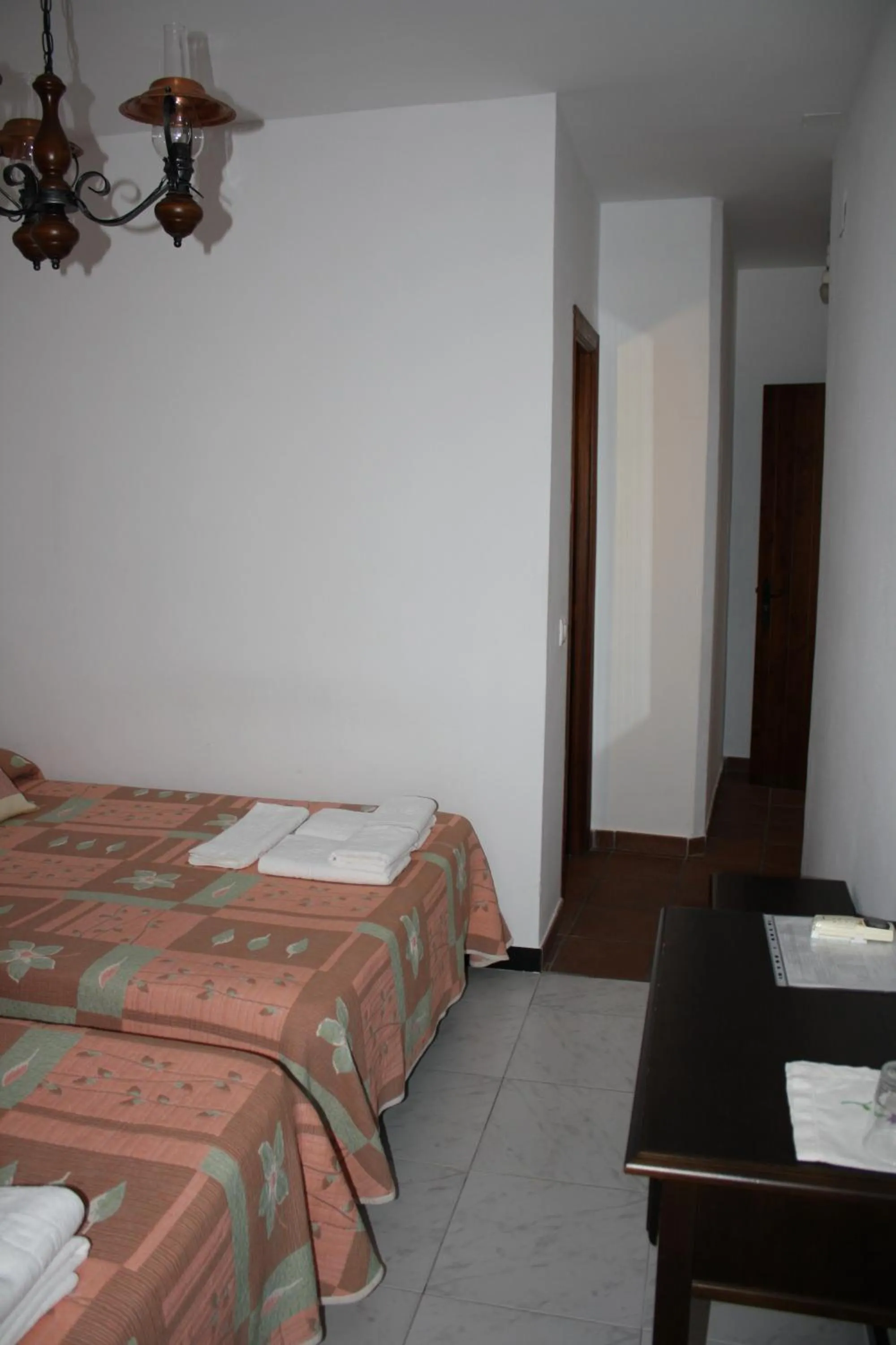 Photo of the whole room, Bed in Hostal Torre de Guzmán