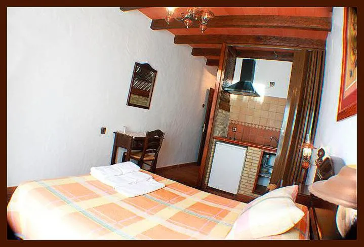 Photo of the whole room, Bed in Hostal Torre de Guzmán