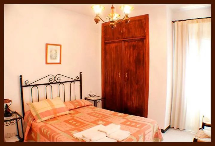 Photo of the whole room, Bed in Hostal Torre de Guzmán
