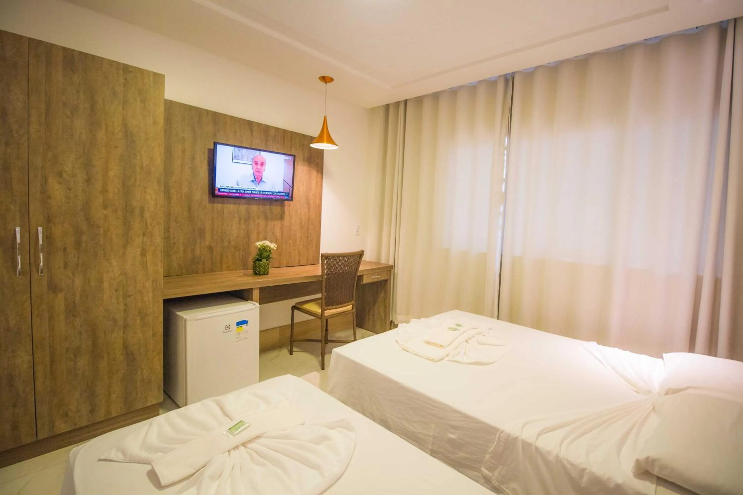 Bed in Hotel Bem Brasil