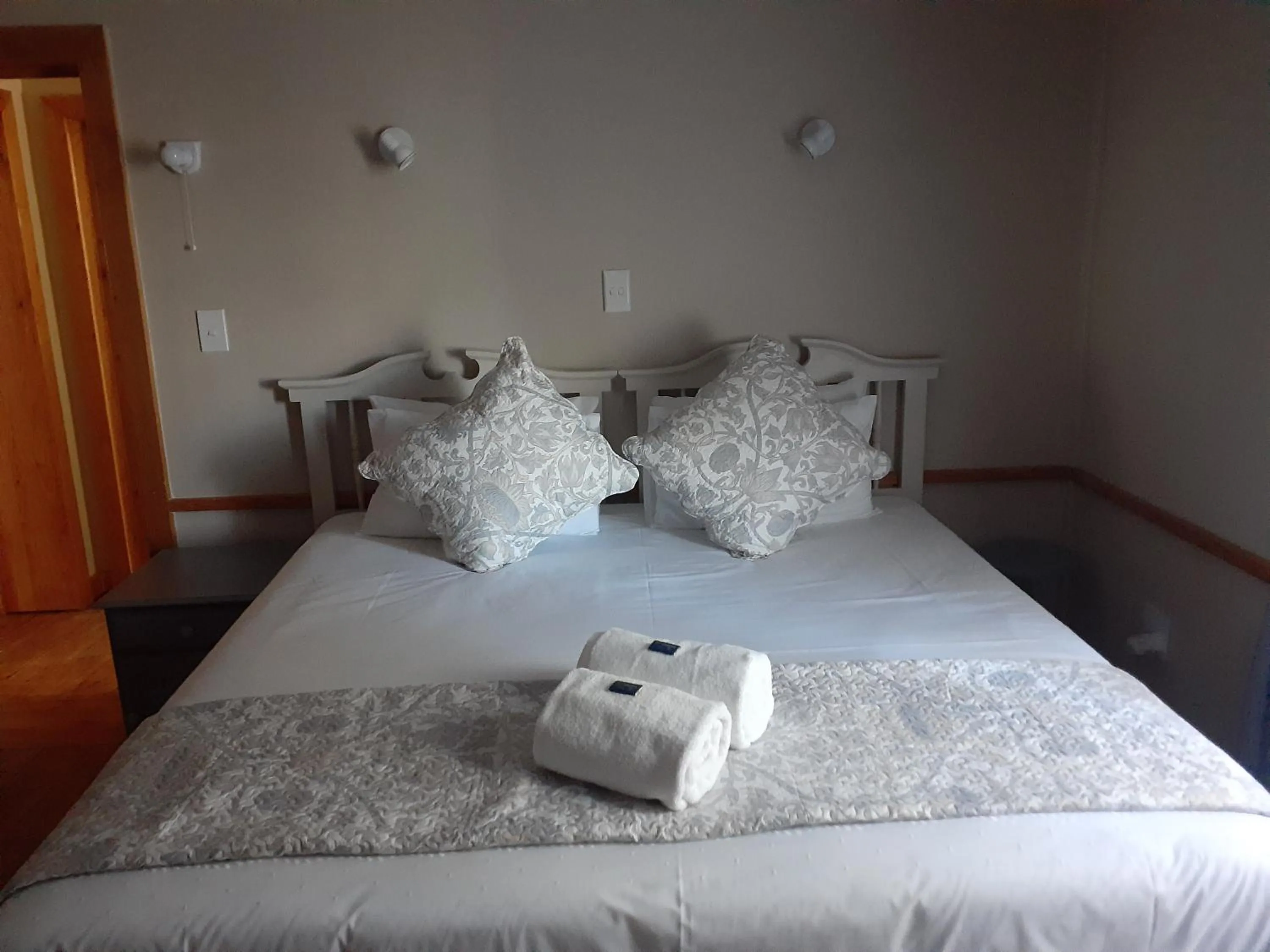 Bed in Sandstone Chameleon Guest House