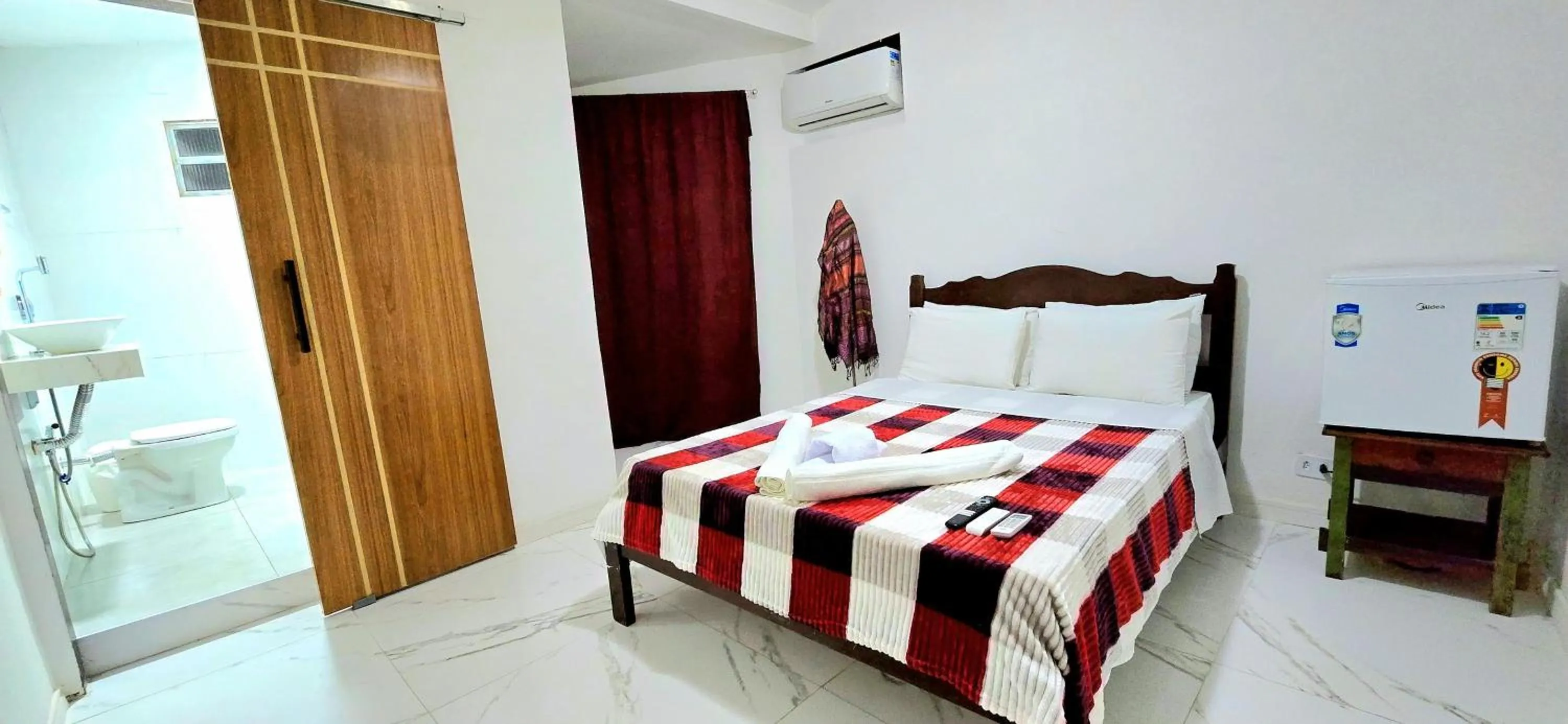 Bed in Pousada Sobre As Ondas de Picinguaba