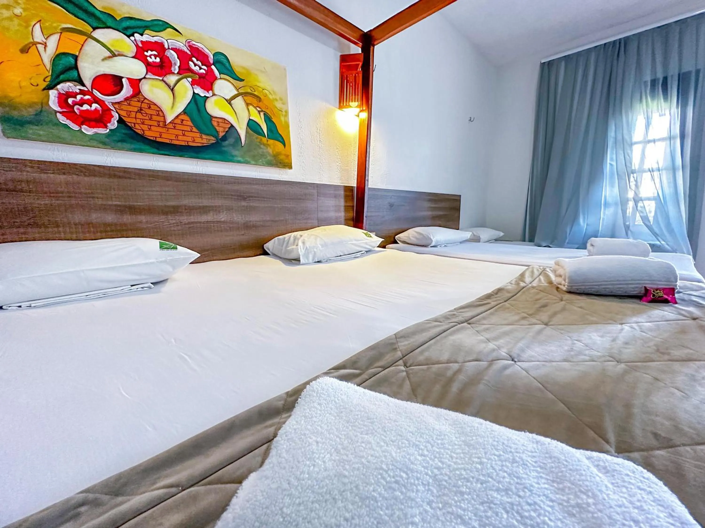 Photo of the whole room, Bed in Jangadeiro Praia Hotel Resort - Parque Aquático e Pé na Areia