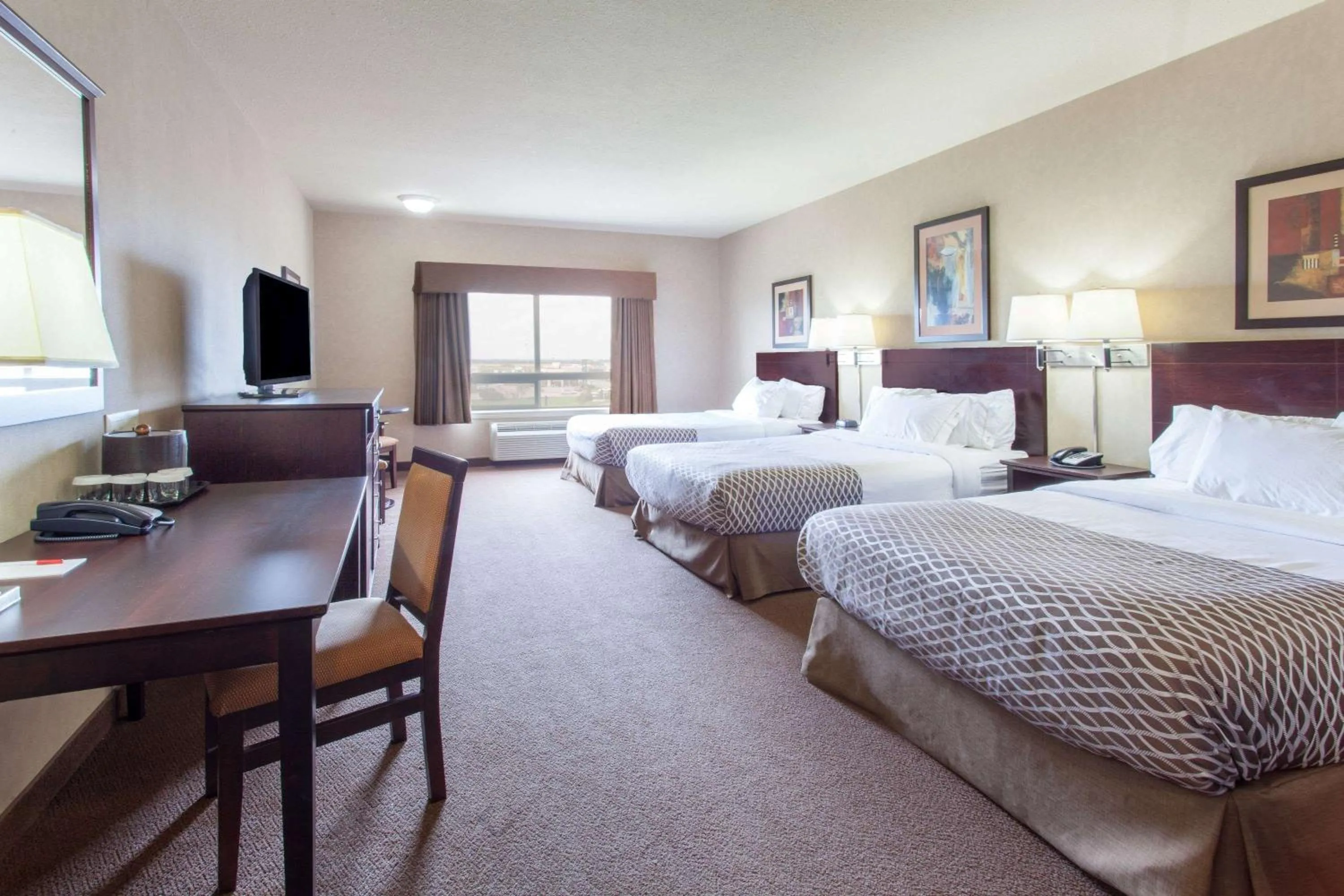 Photo of the whole room, Bed in Ramada by Wyndham Camrose