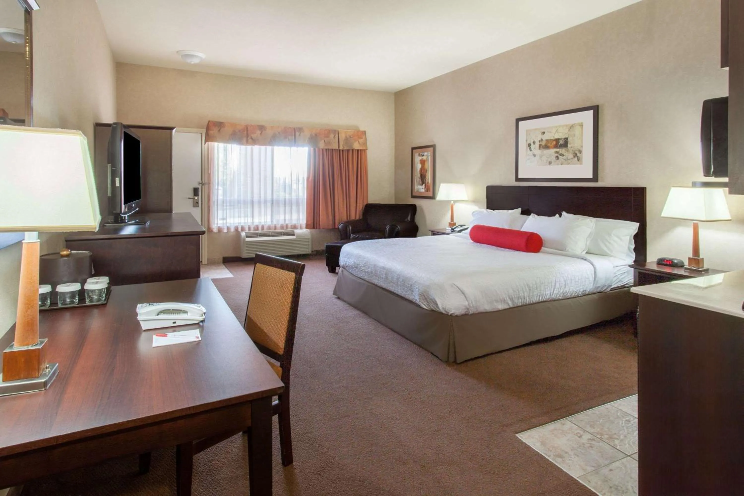 Photo of the whole room, Bed in Ramada by Wyndham Camrose