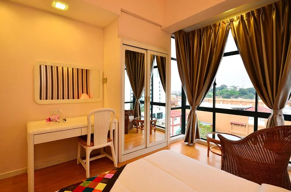 Bed in Jetty Suites Apartments