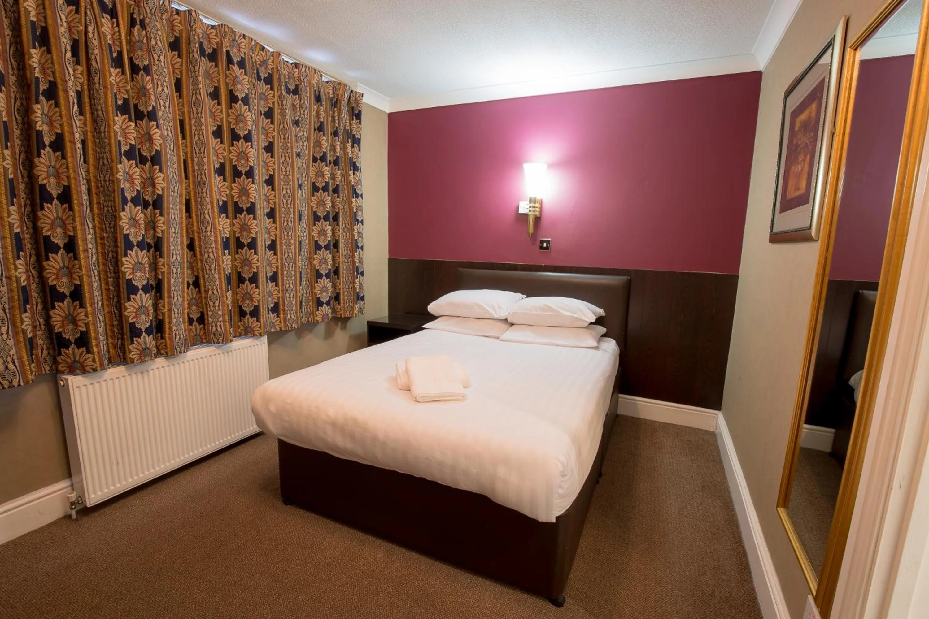 Bed in Rossmore Hotel