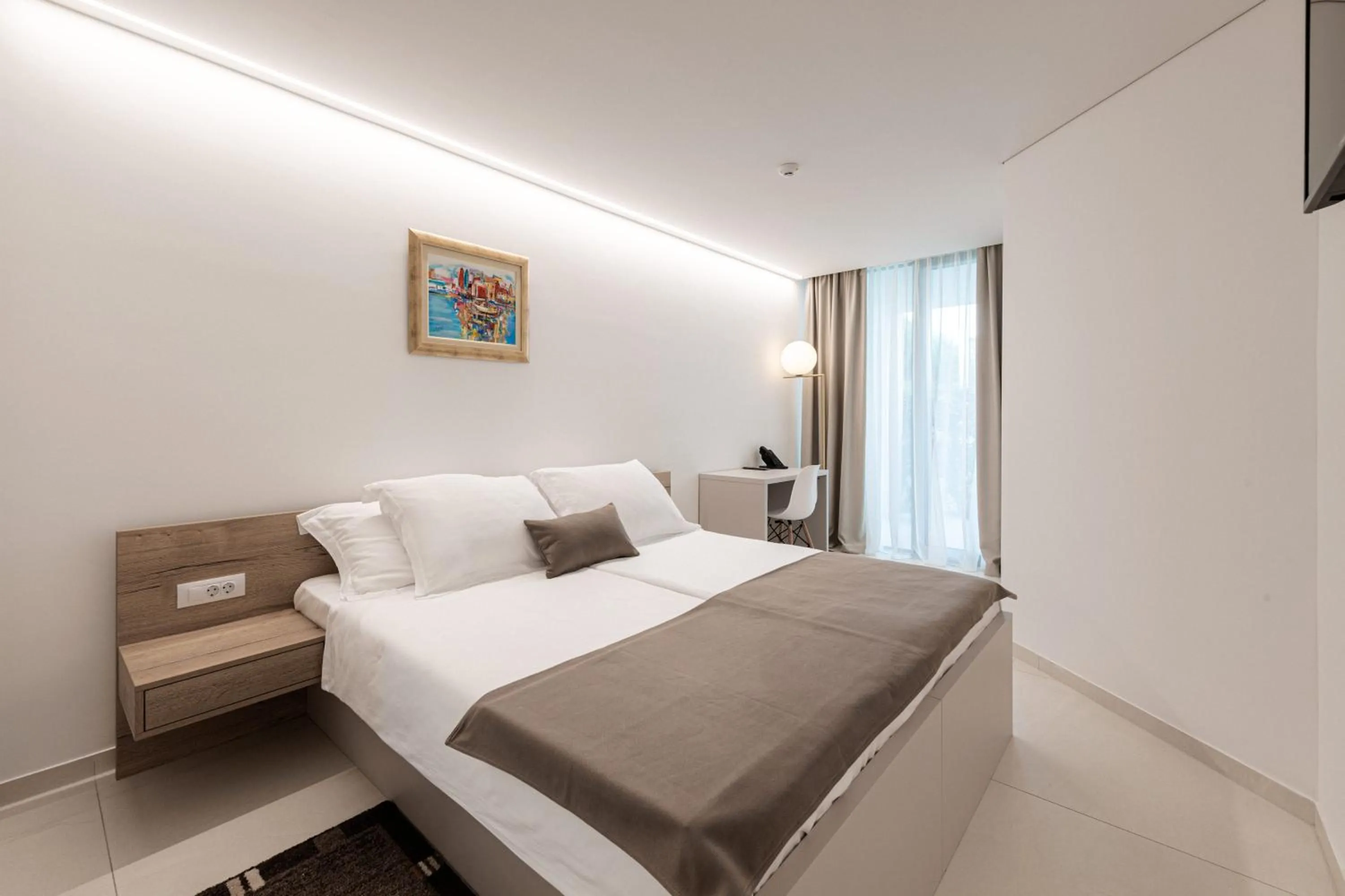 Bed in Aparthotel Joel