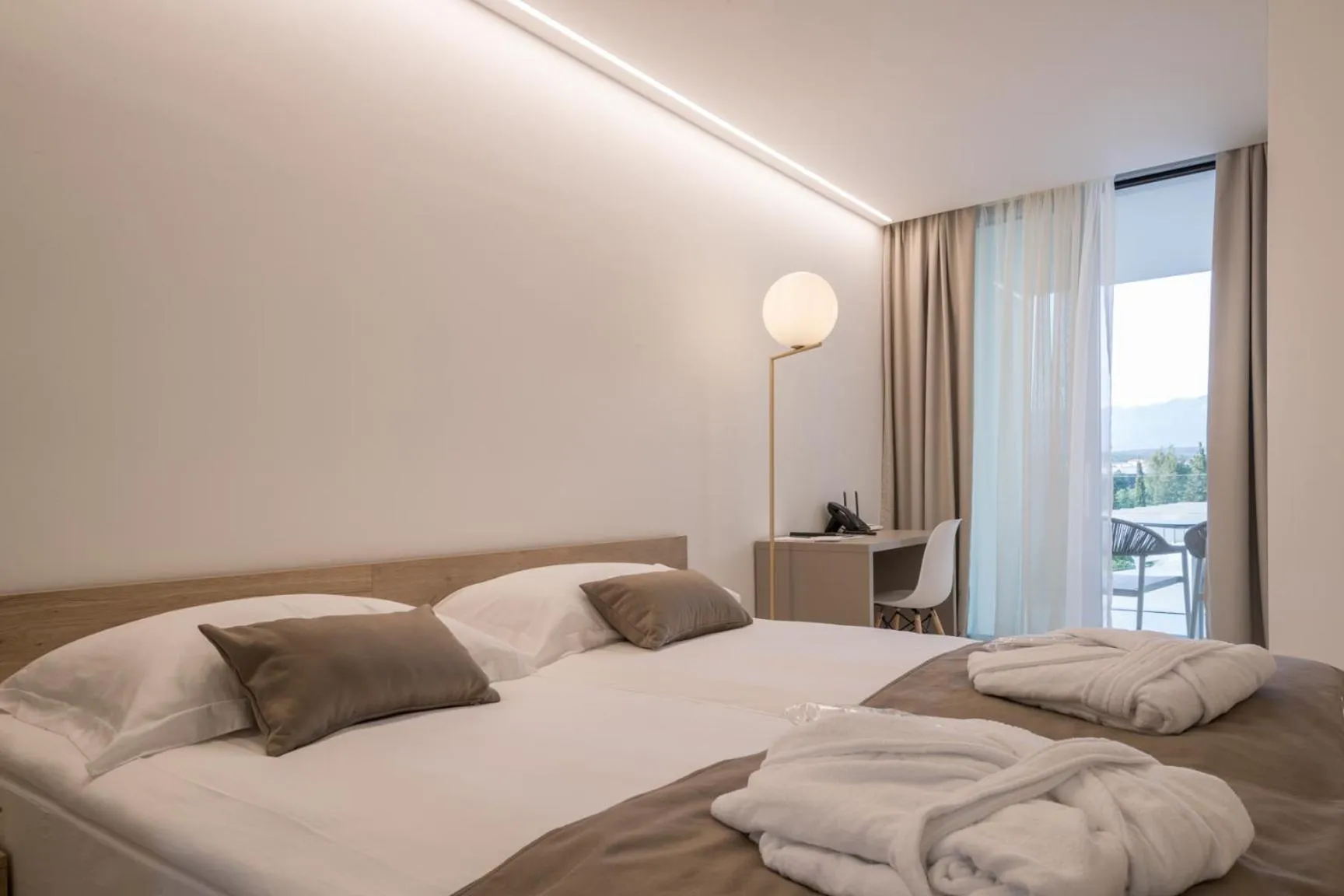 Bed in Aparthotel Joel