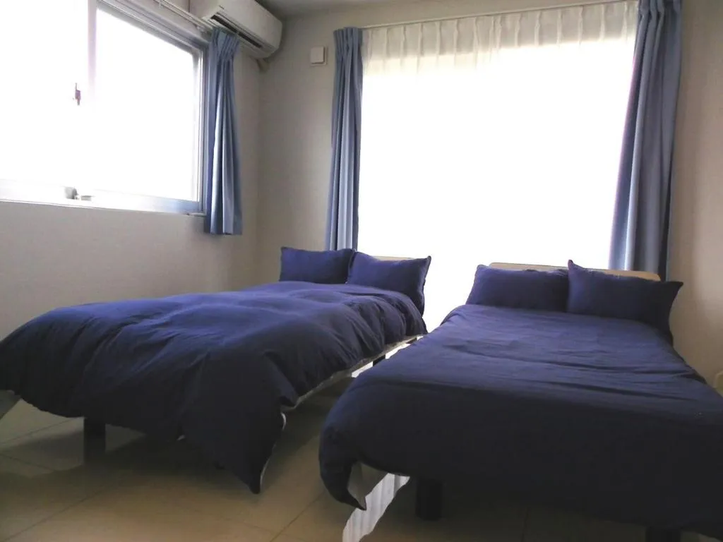 Bedroom, Bed in Guest House Miyakojima