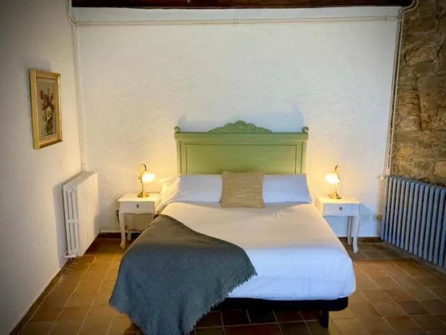 Bed in Masia Can Pou