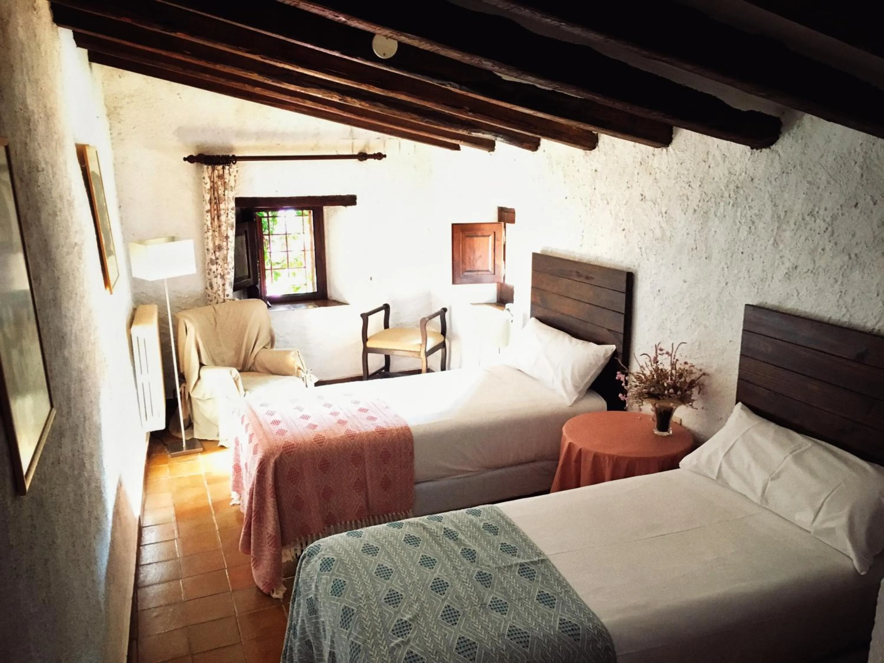 Bed in Masia Can Pou