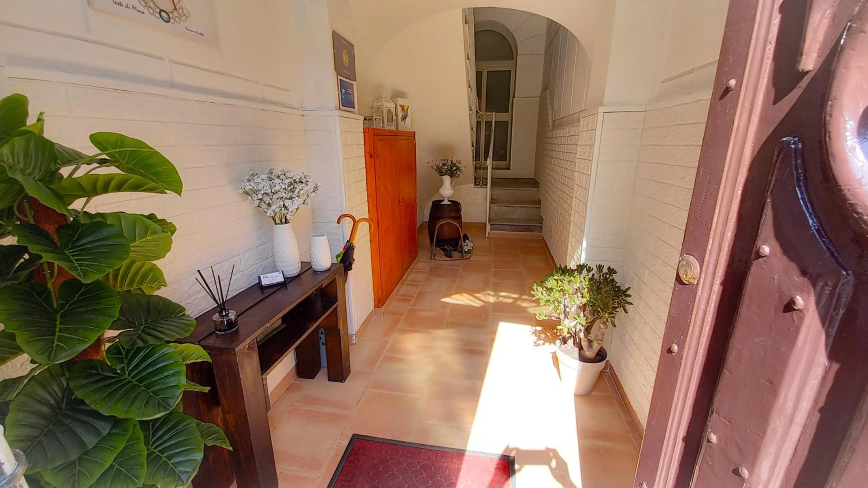 Lobby or reception in BED&BOOK Palazzo Cutelli