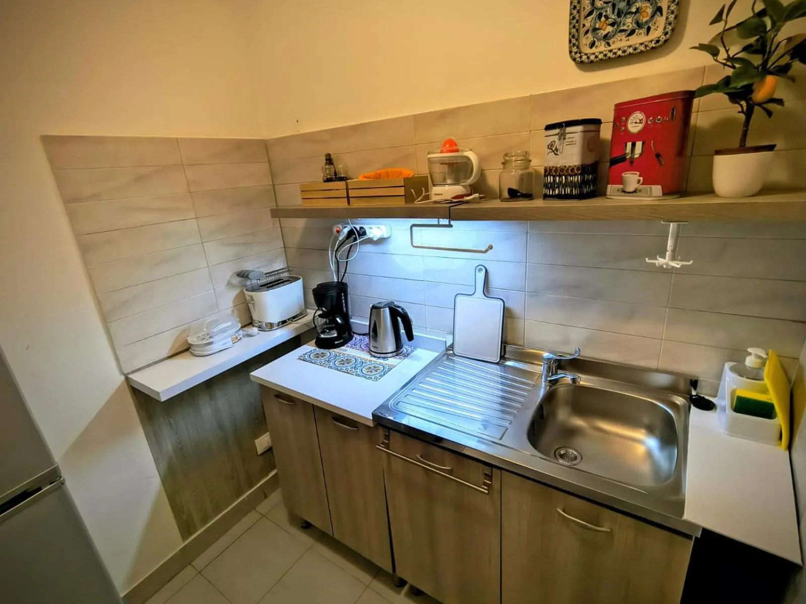 Kitchen or kitchenette in BED&BOOK Palazzo Cutelli