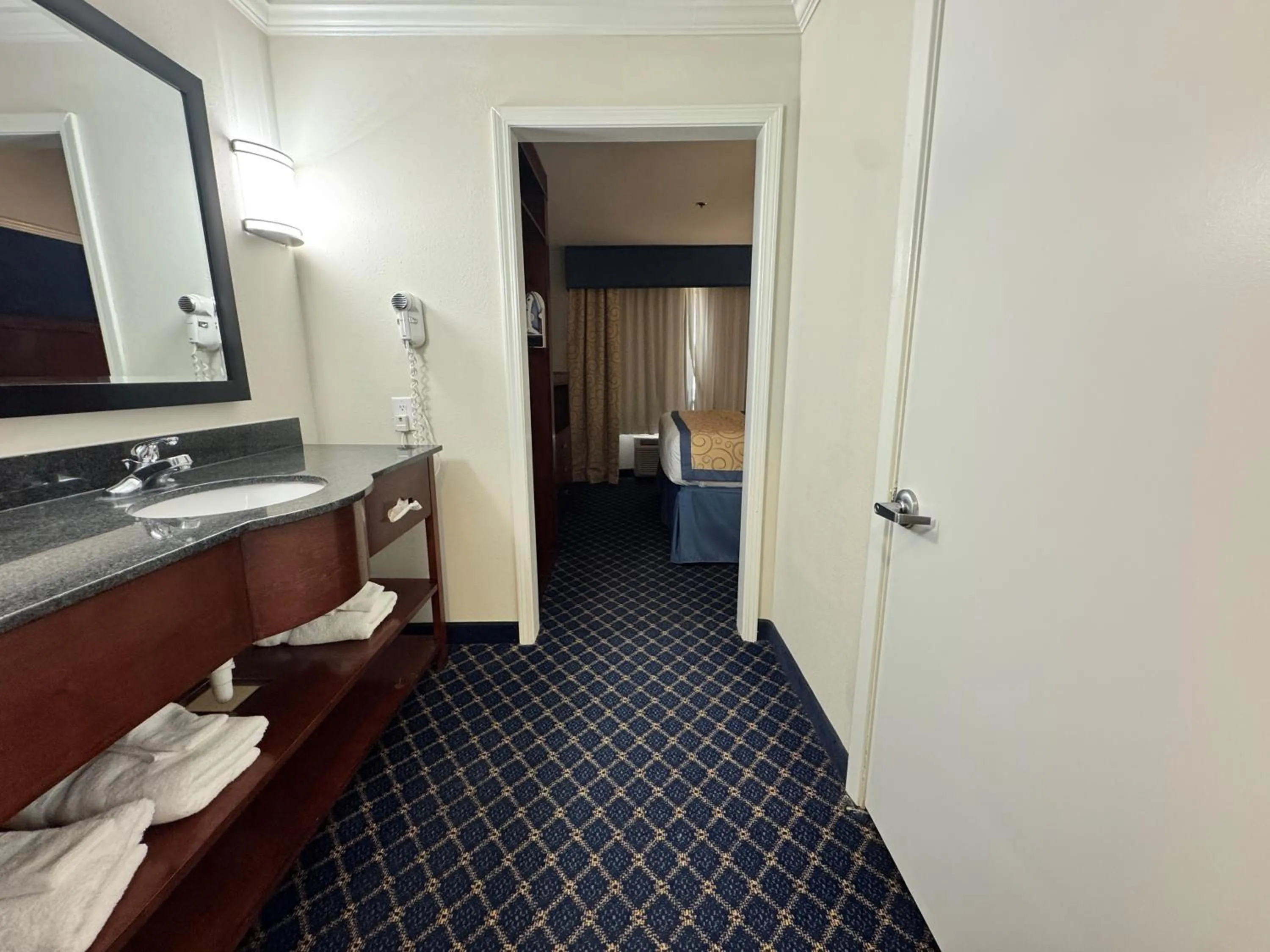 Bathroom in Baymont by Wyndham McComb