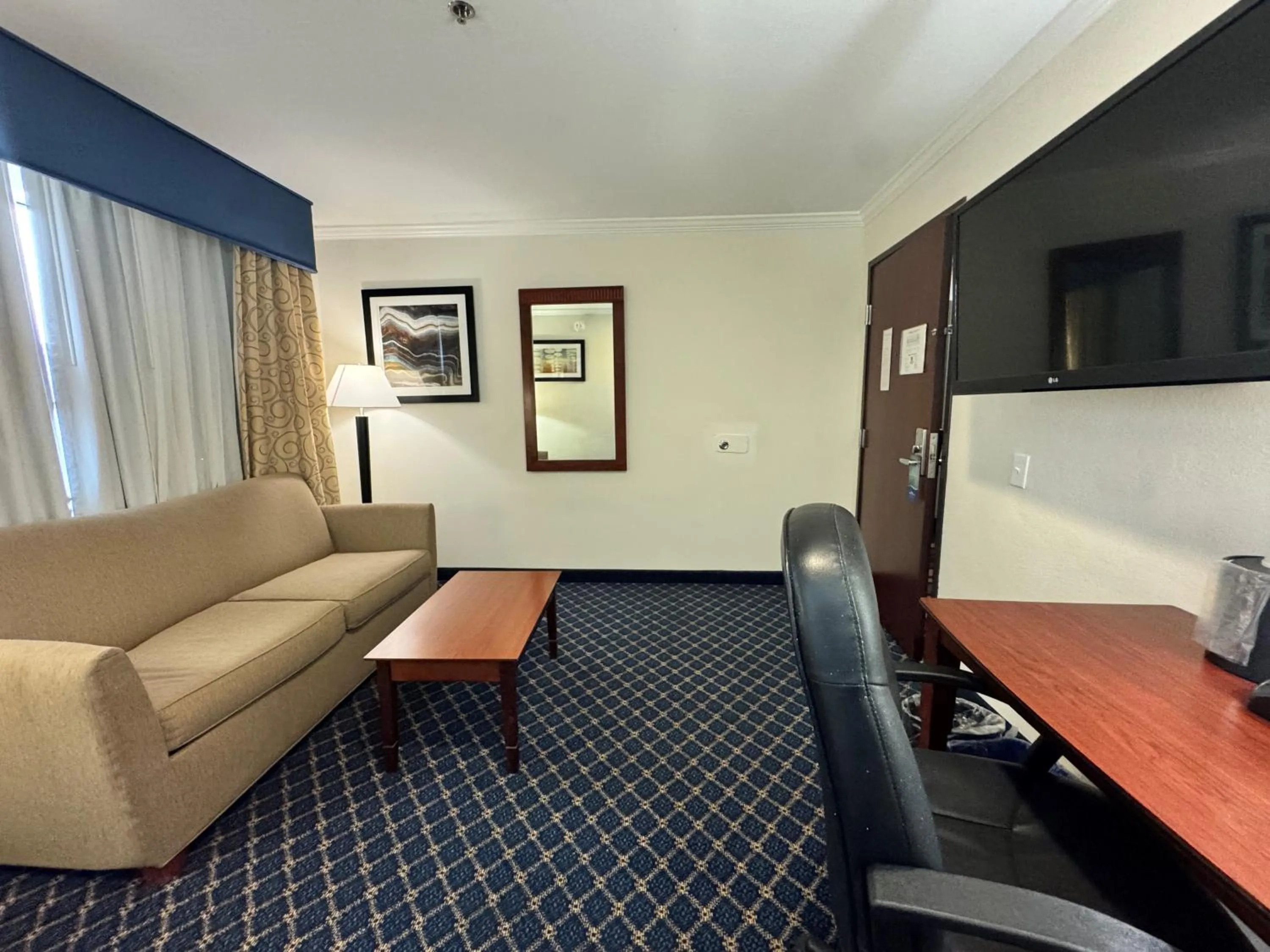 Seating area in Baymont by Wyndham McComb