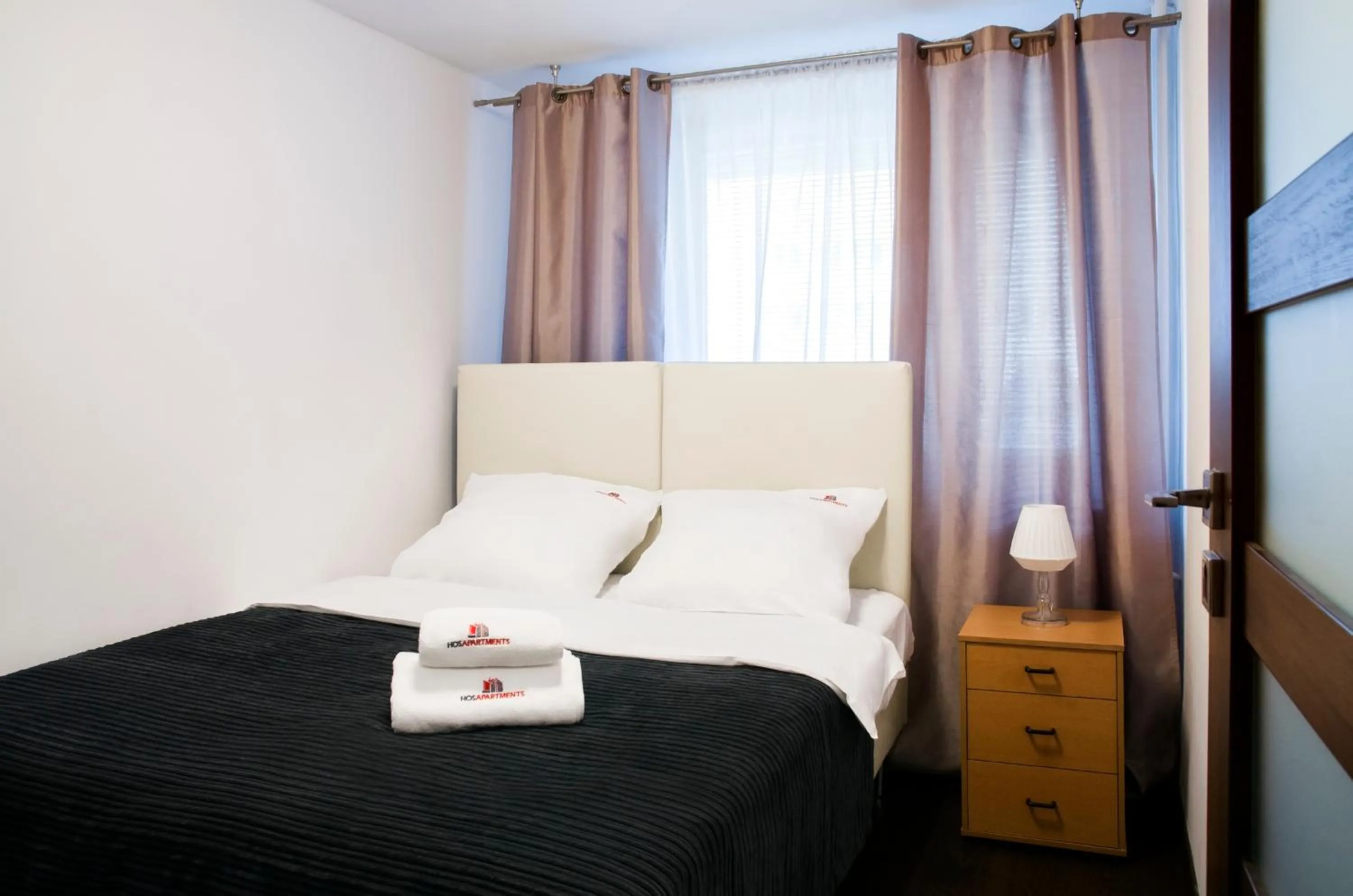 Photo of the whole room, Bed in Hosapartments City Center