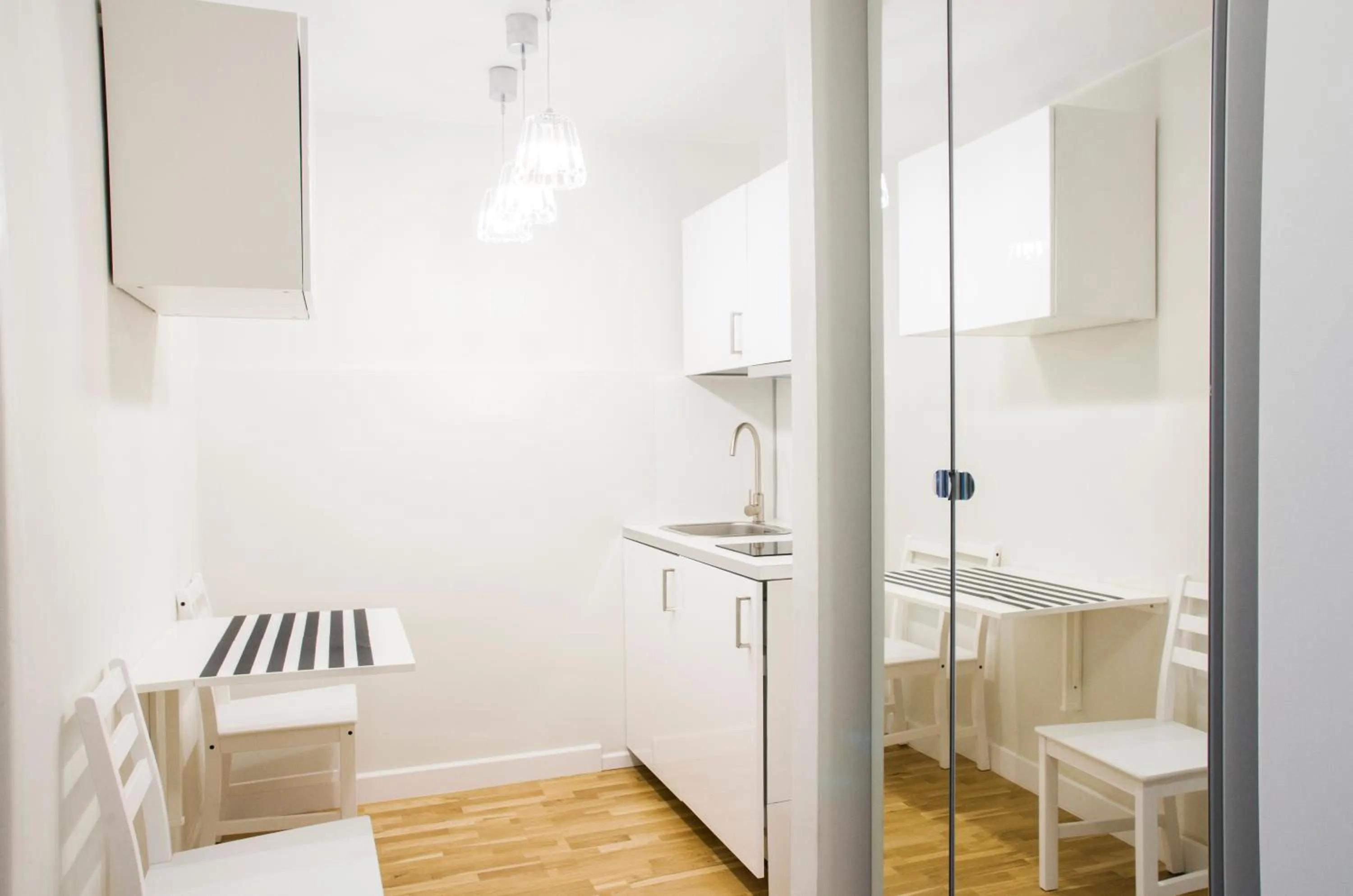Kitchen or kitchenette in Hosapartments City Center