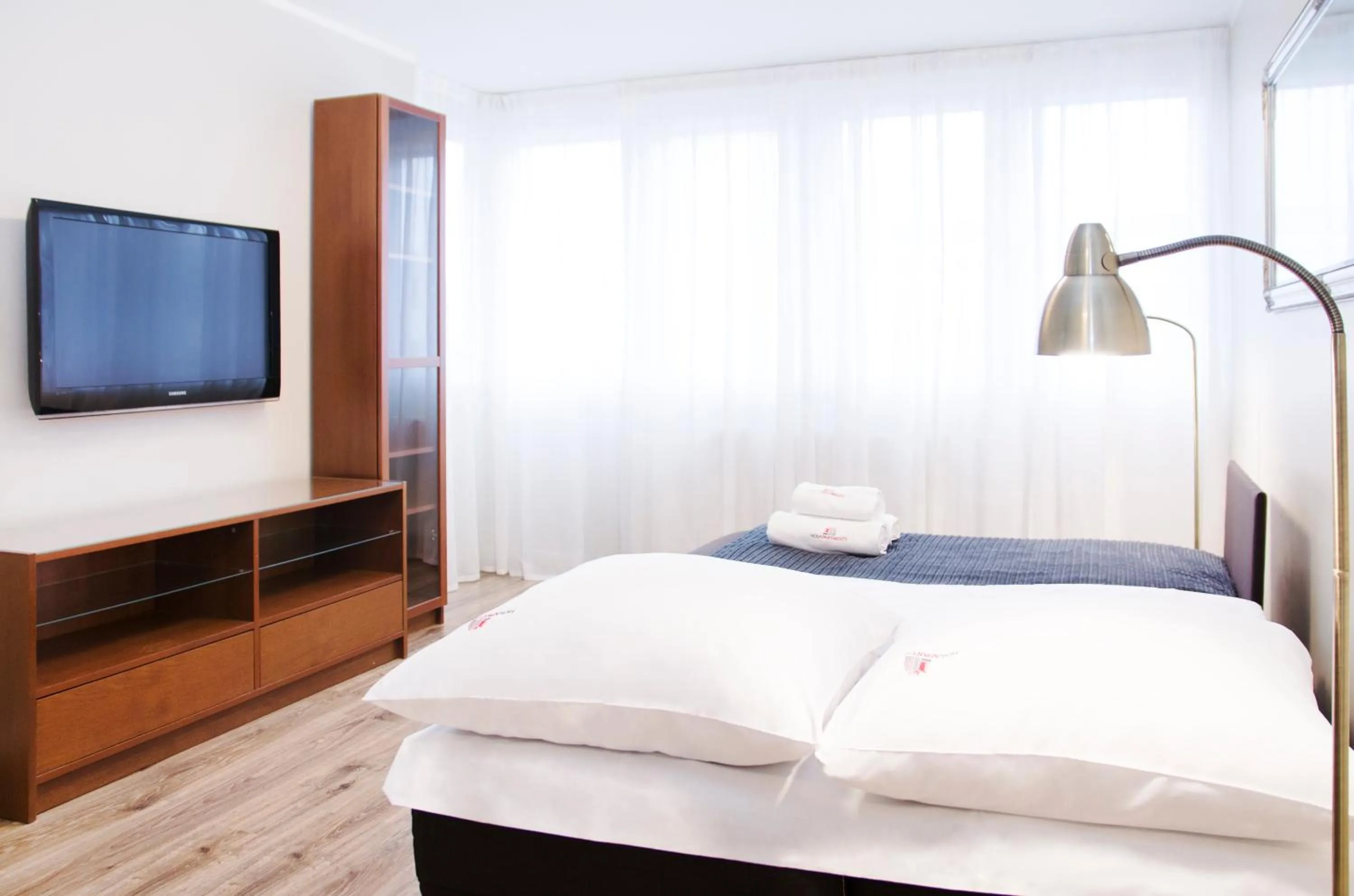 TV and multimedia, Bed in Hosapartments City Center