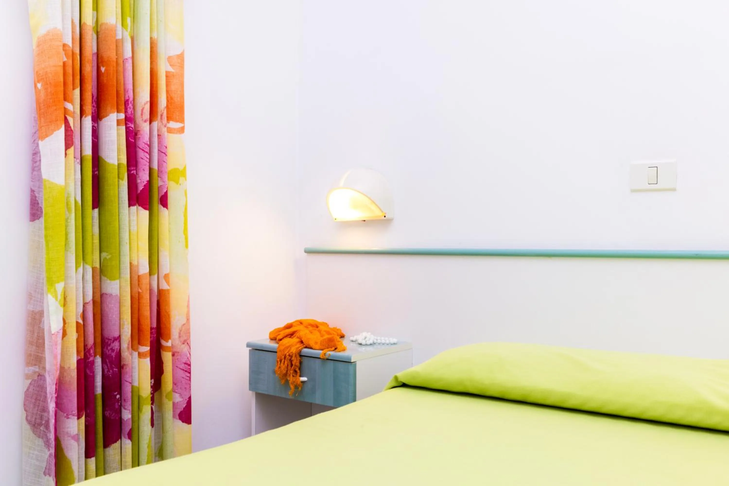 Bed in Baia Degli Aranci Suite & Apartments