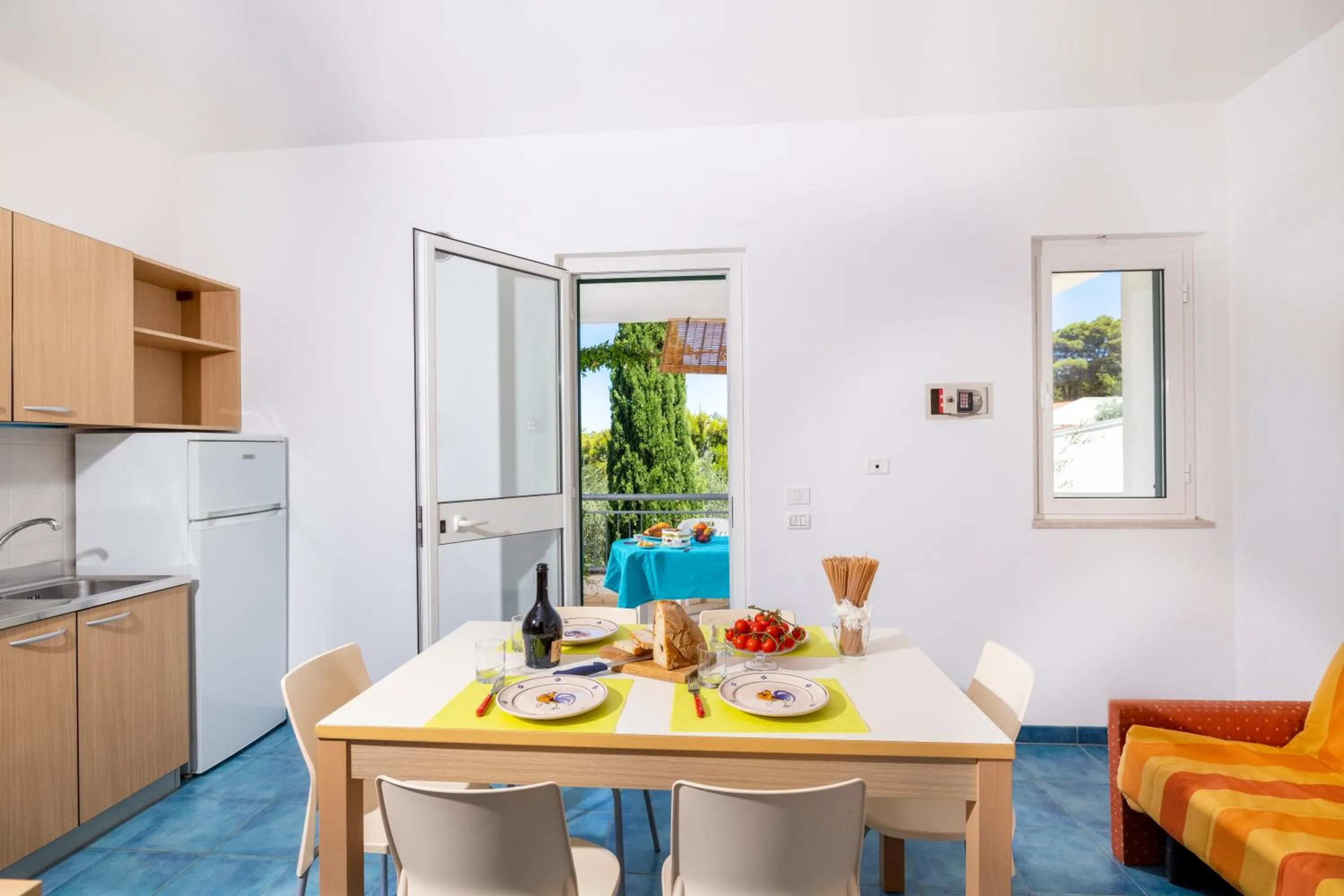 Kitchen or kitchenette in Baia Degli Aranci Suite & Apartments