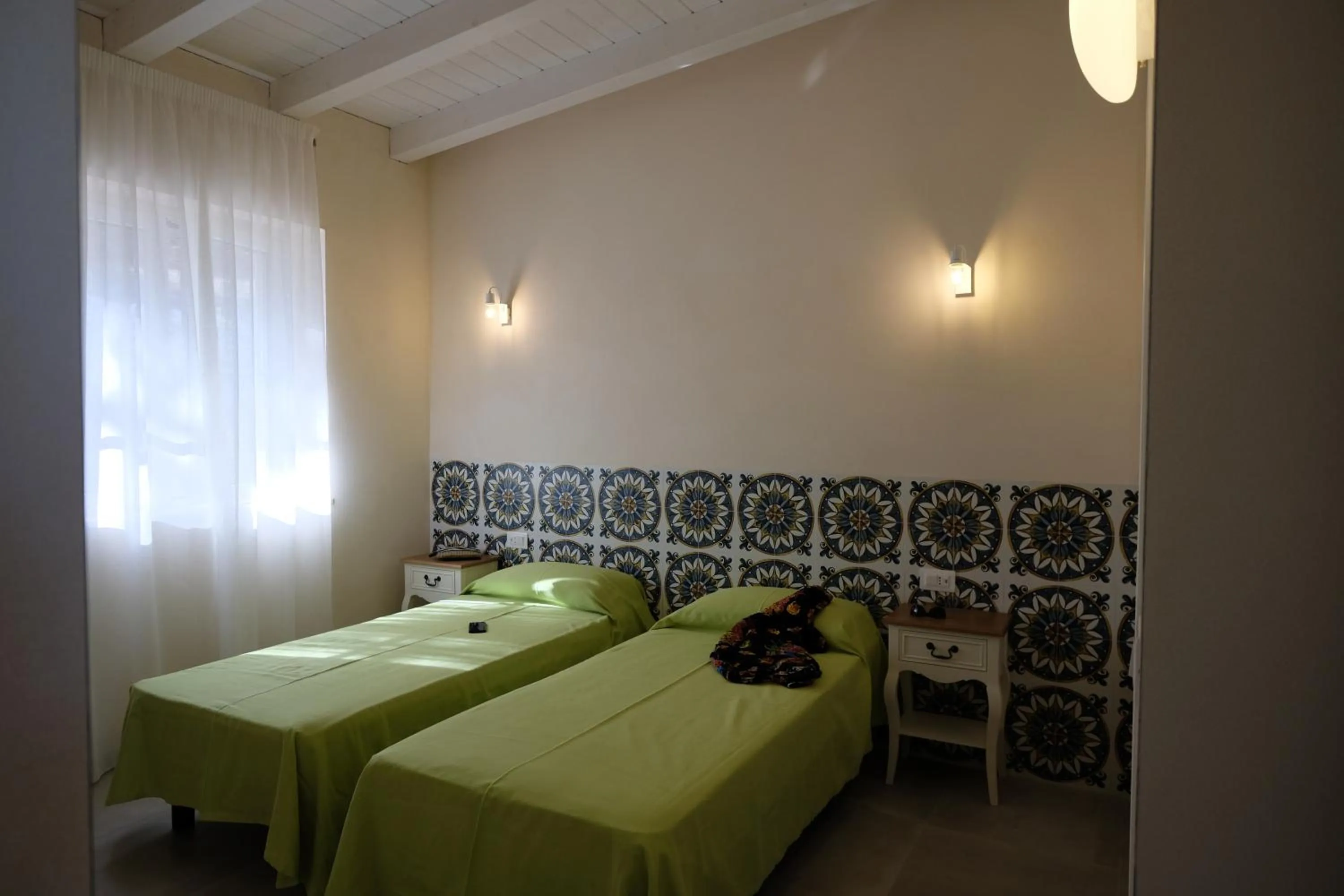 Bedroom, Bed in Baia Degli Aranci Suite & Apartments