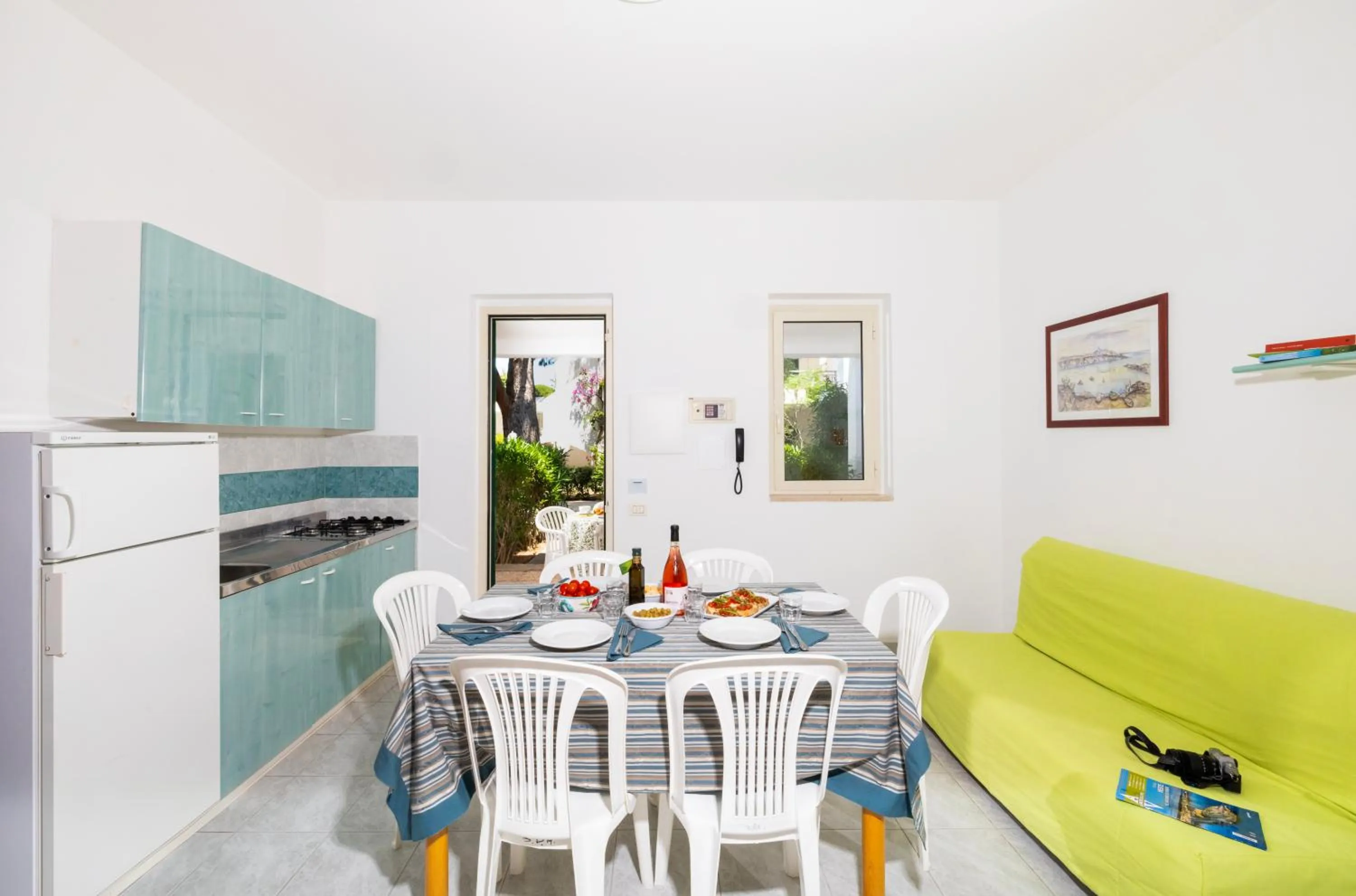 Kitchen or kitchenette in Baia Degli Aranci Suite & Apartments