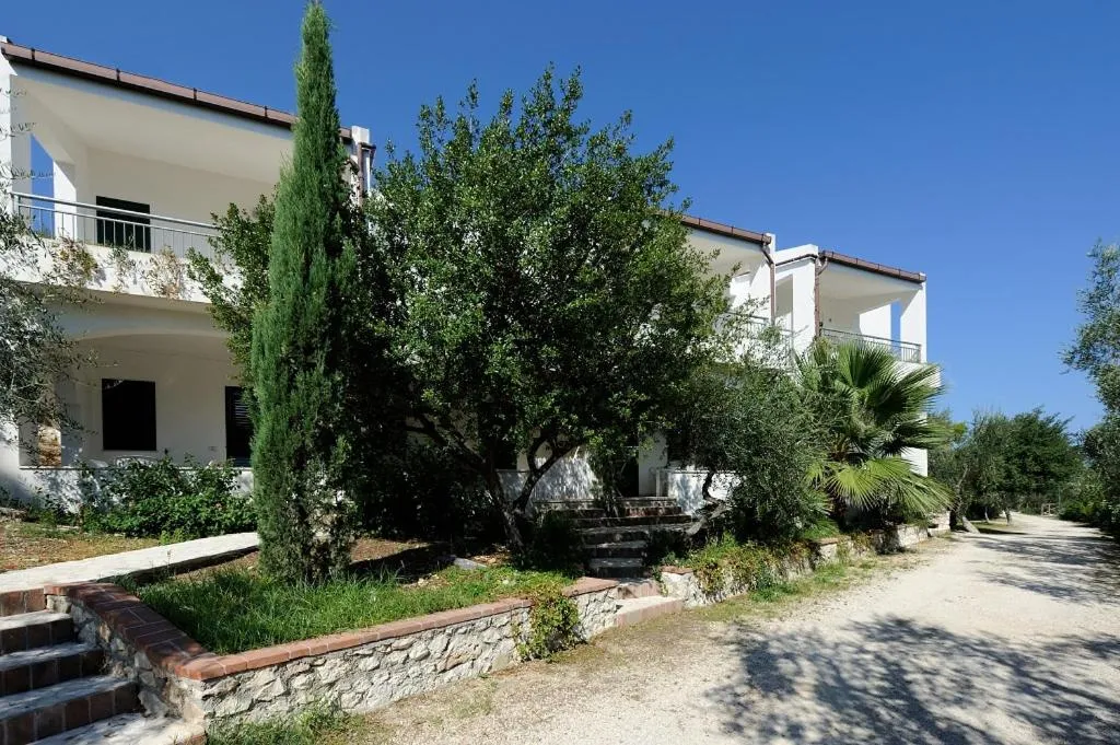 Garden in Baia Degli Aranci Suite & Apartments