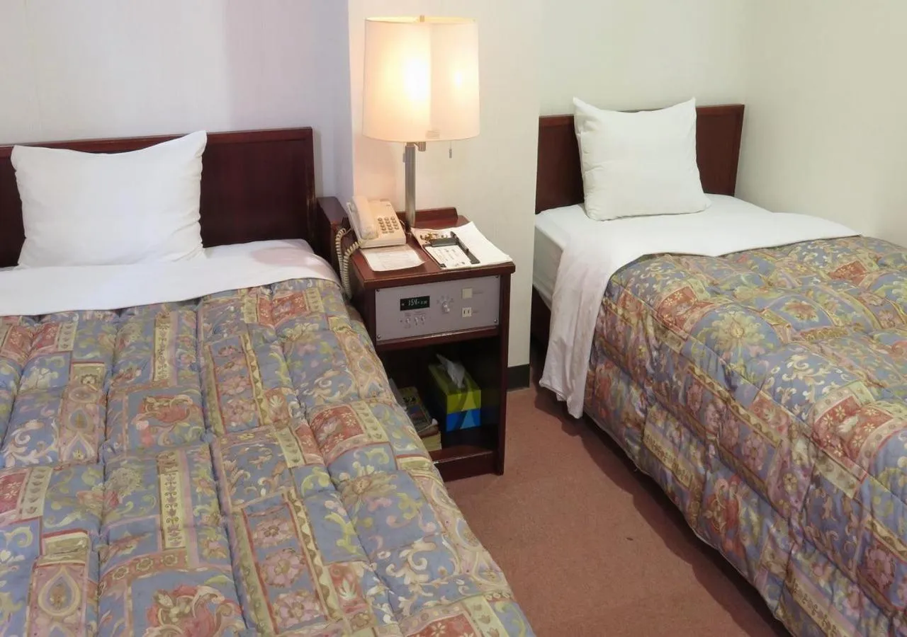 Bed in Hotel kakuban