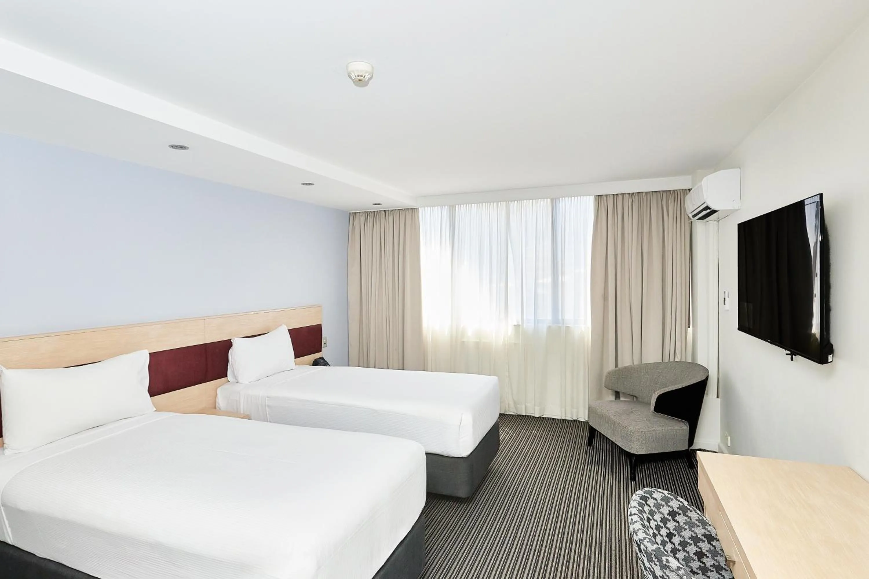 Bed in Central Studio Hotel Sydney