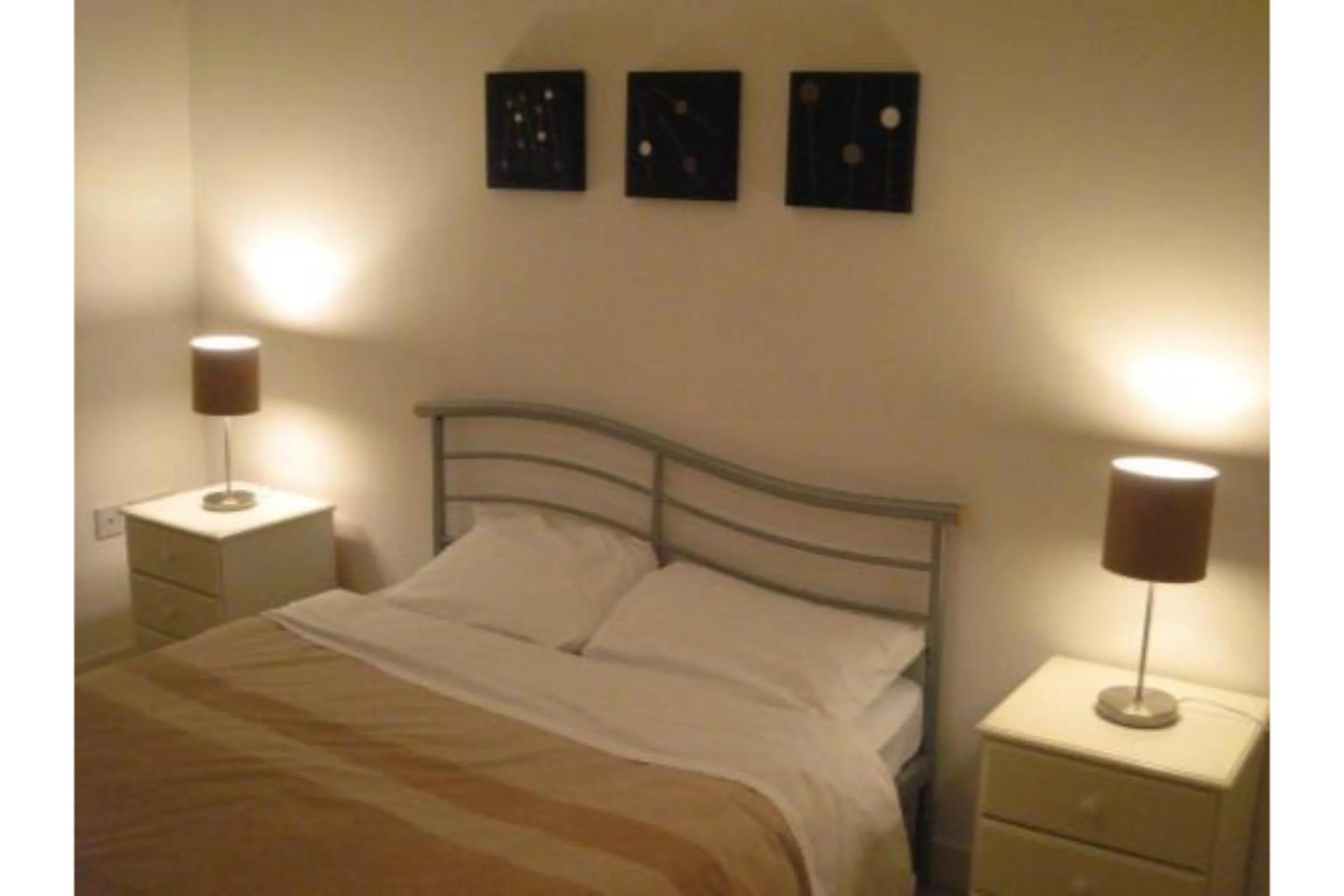 Bedroom in OYO Arinza Apartments